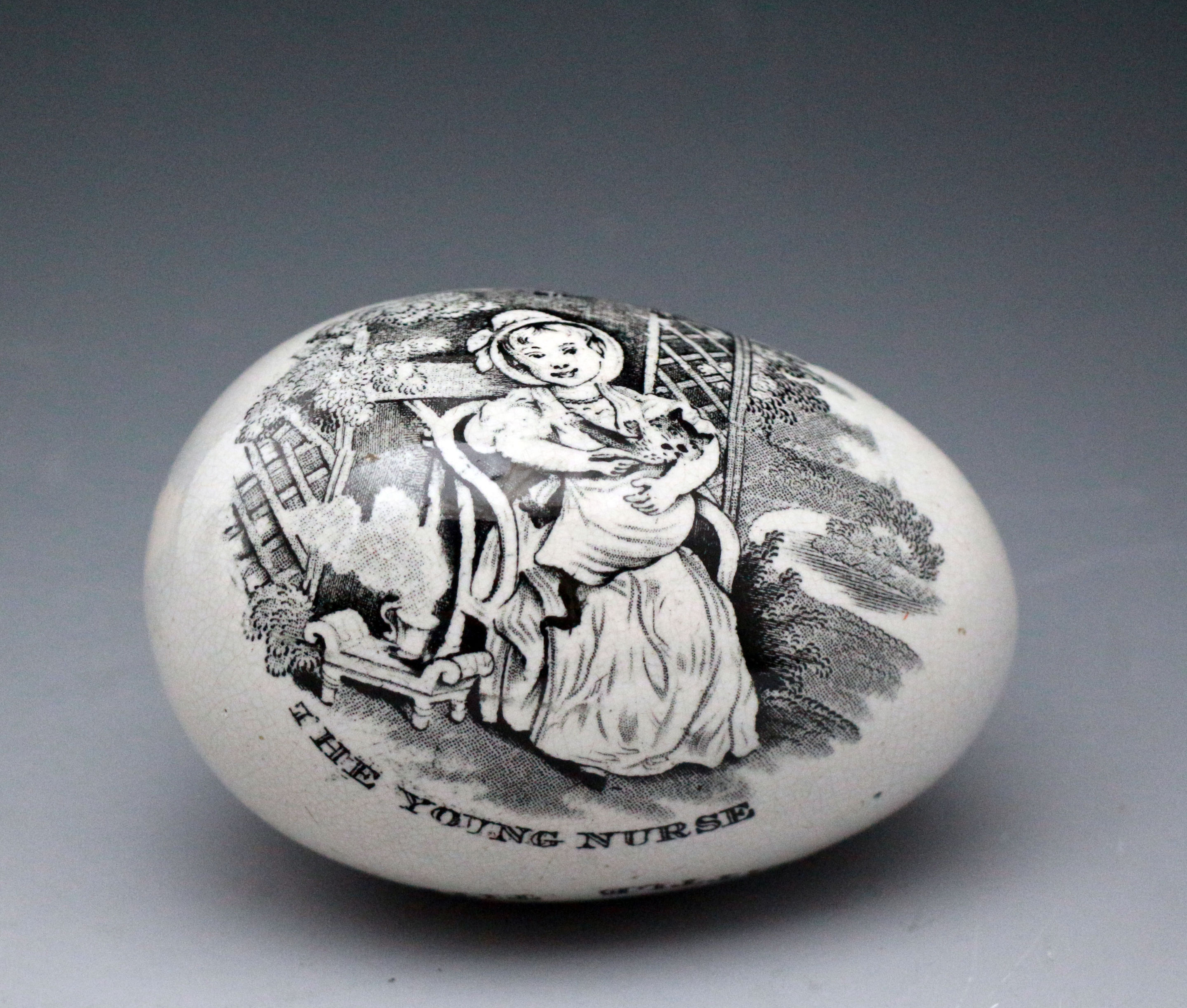 Whitehaven Pottery darning egg with transfer prints 19thc