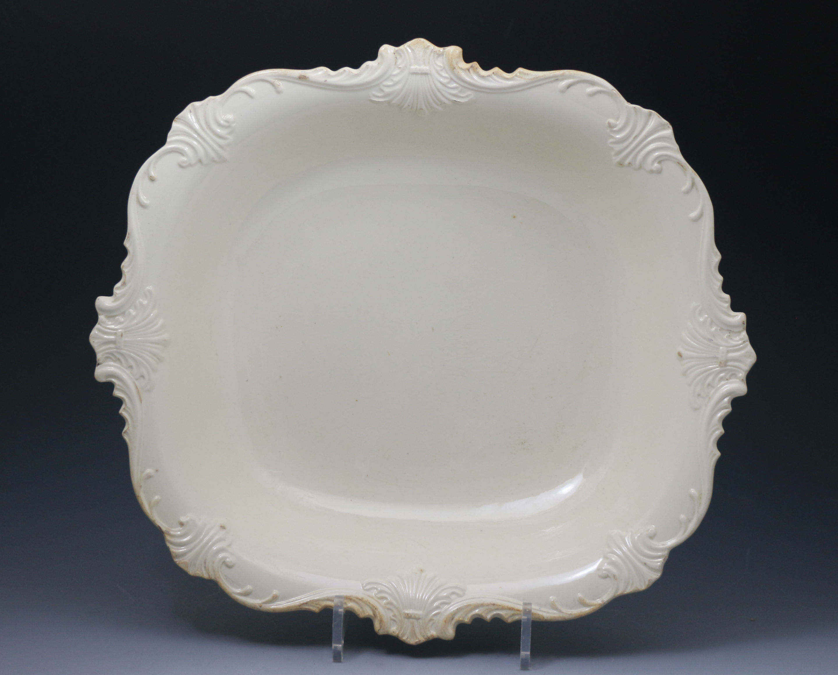 Antique Creamware pottery dish with rococo border , English late 18th century
