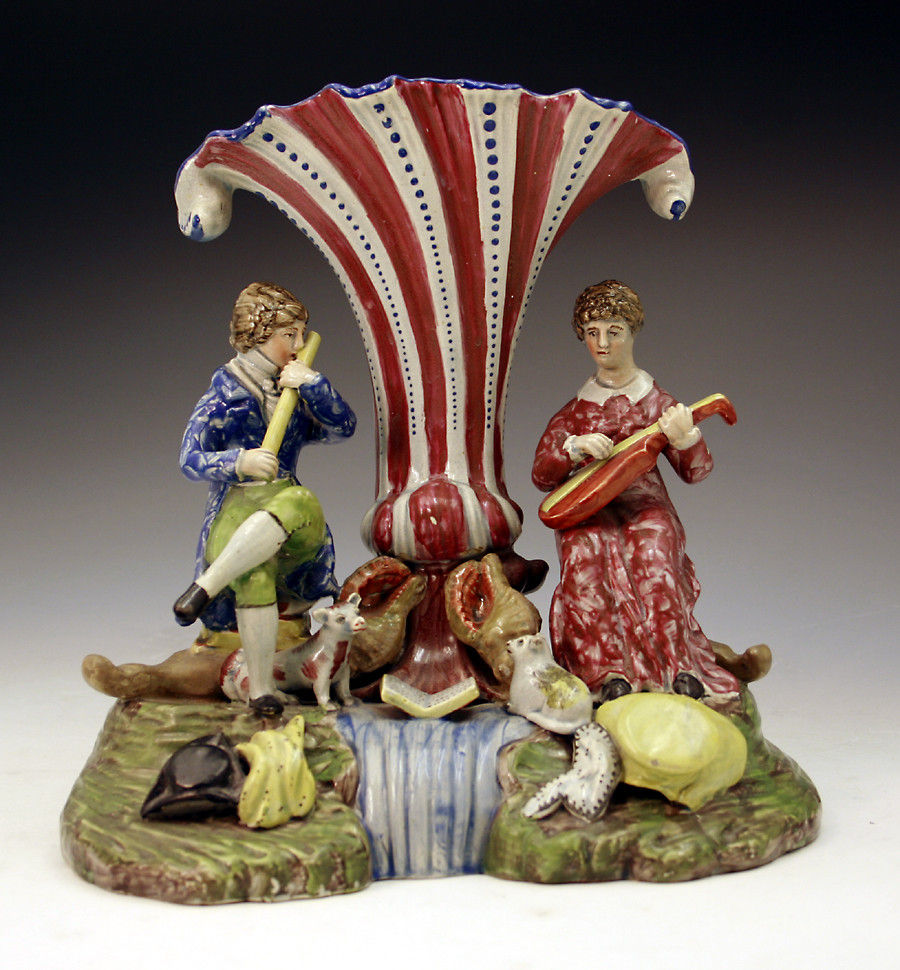 Antique Staffordshire pottery trumpet spill vase with musical shepherds