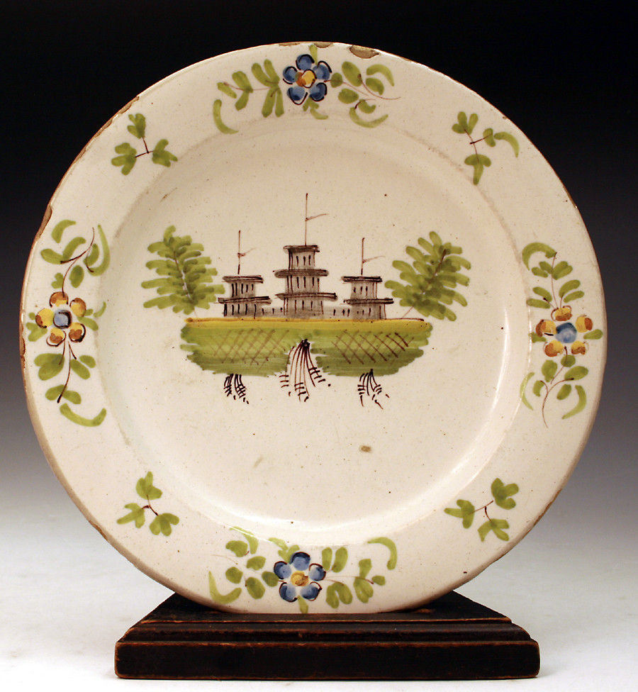 Antique English pottery delftware plate with polychrome decorations c1720