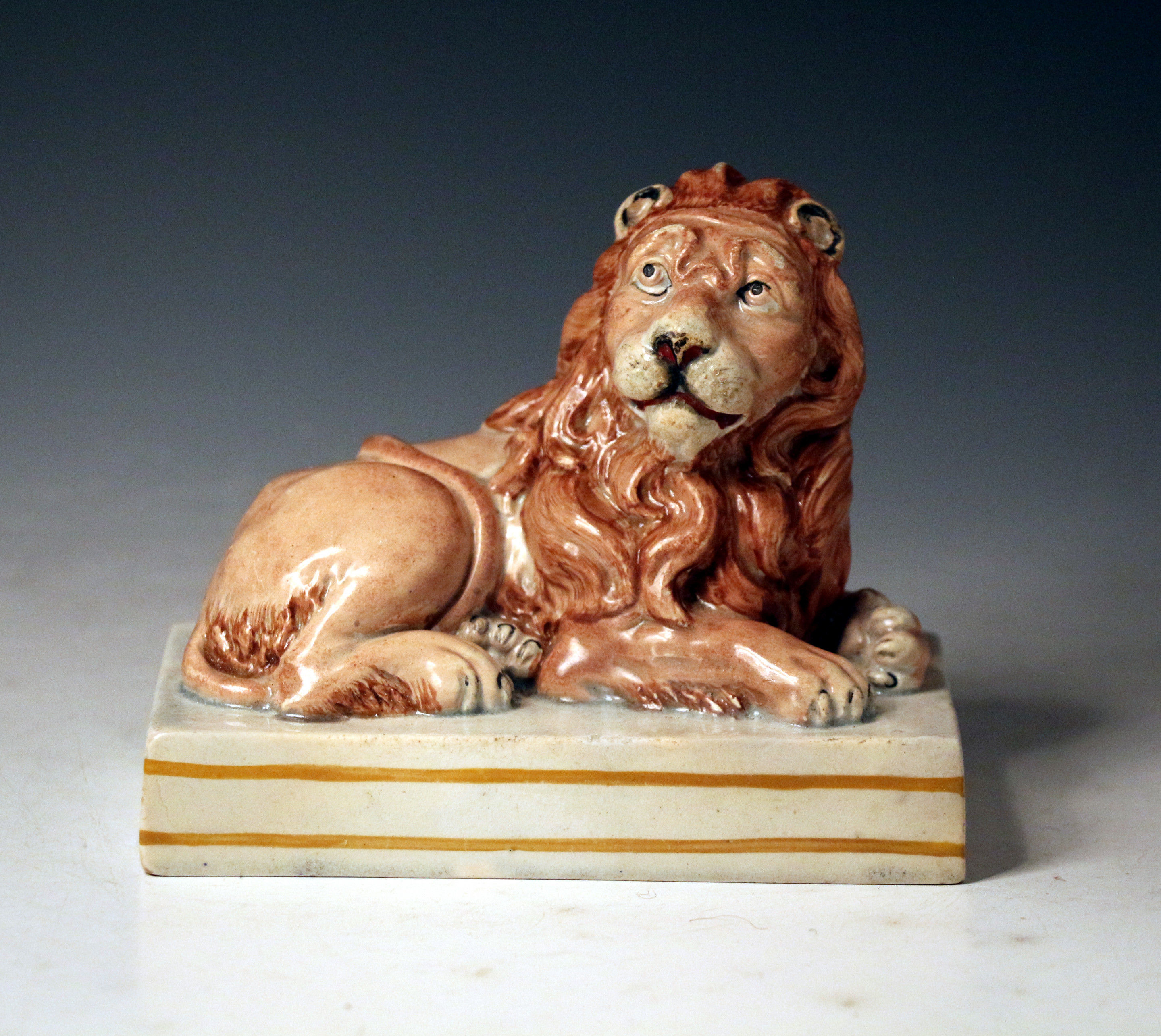 English Staffordshire pottery figure of a Lion impressed Wood and Caldwell 