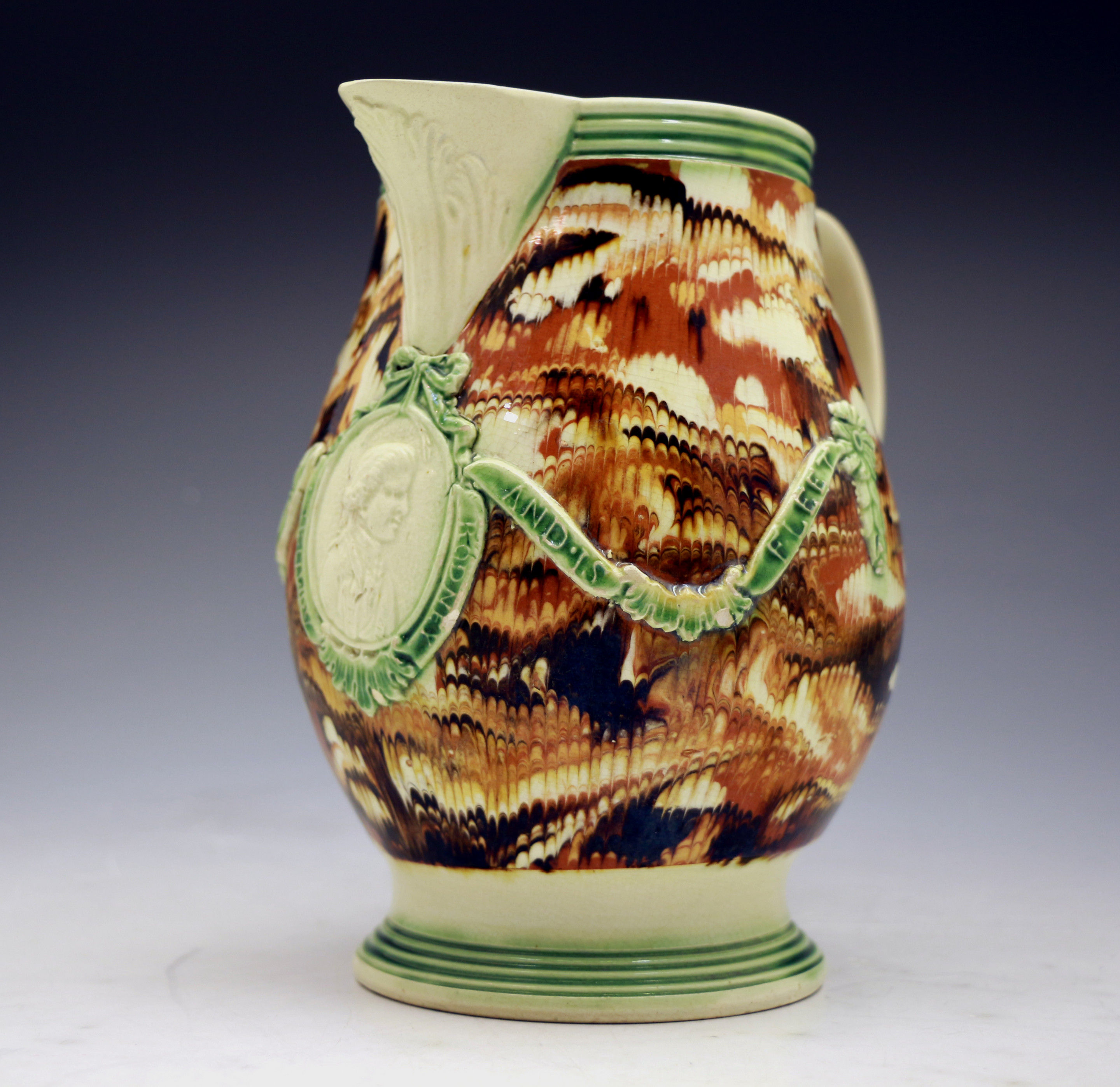 Admiral Rodney creamware pottery surface agate slip decorated pitcher