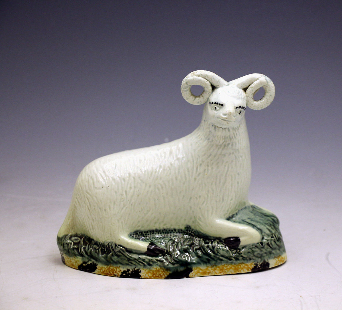 English Yorkshire pottery figure of a ram in Pratt colours c1810