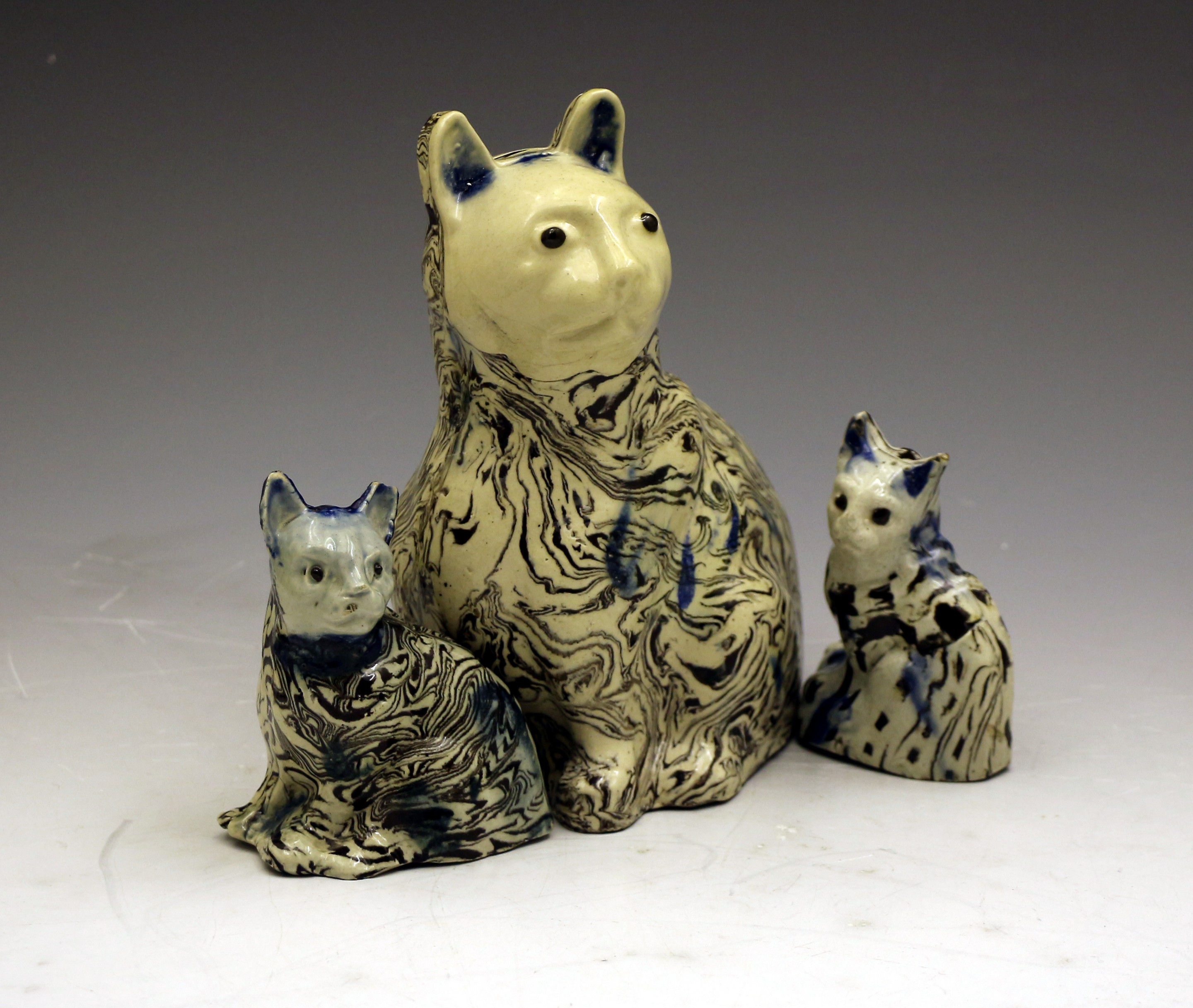 Antique Staffordshire pottery saltglaze variagated figures of cats c1770