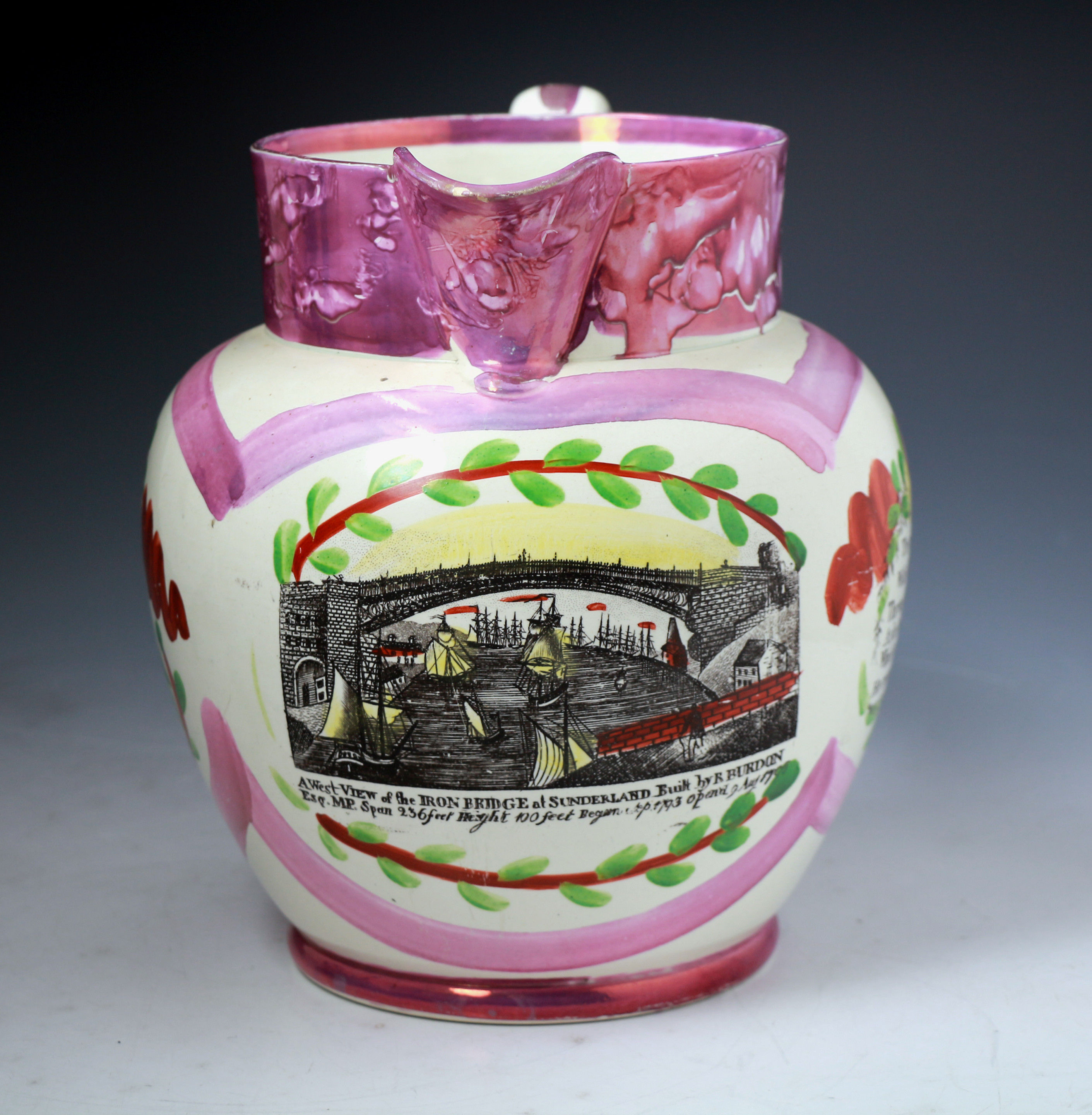 English antique pottery pink luster pitcher with transfer of the Bridge over the Wear