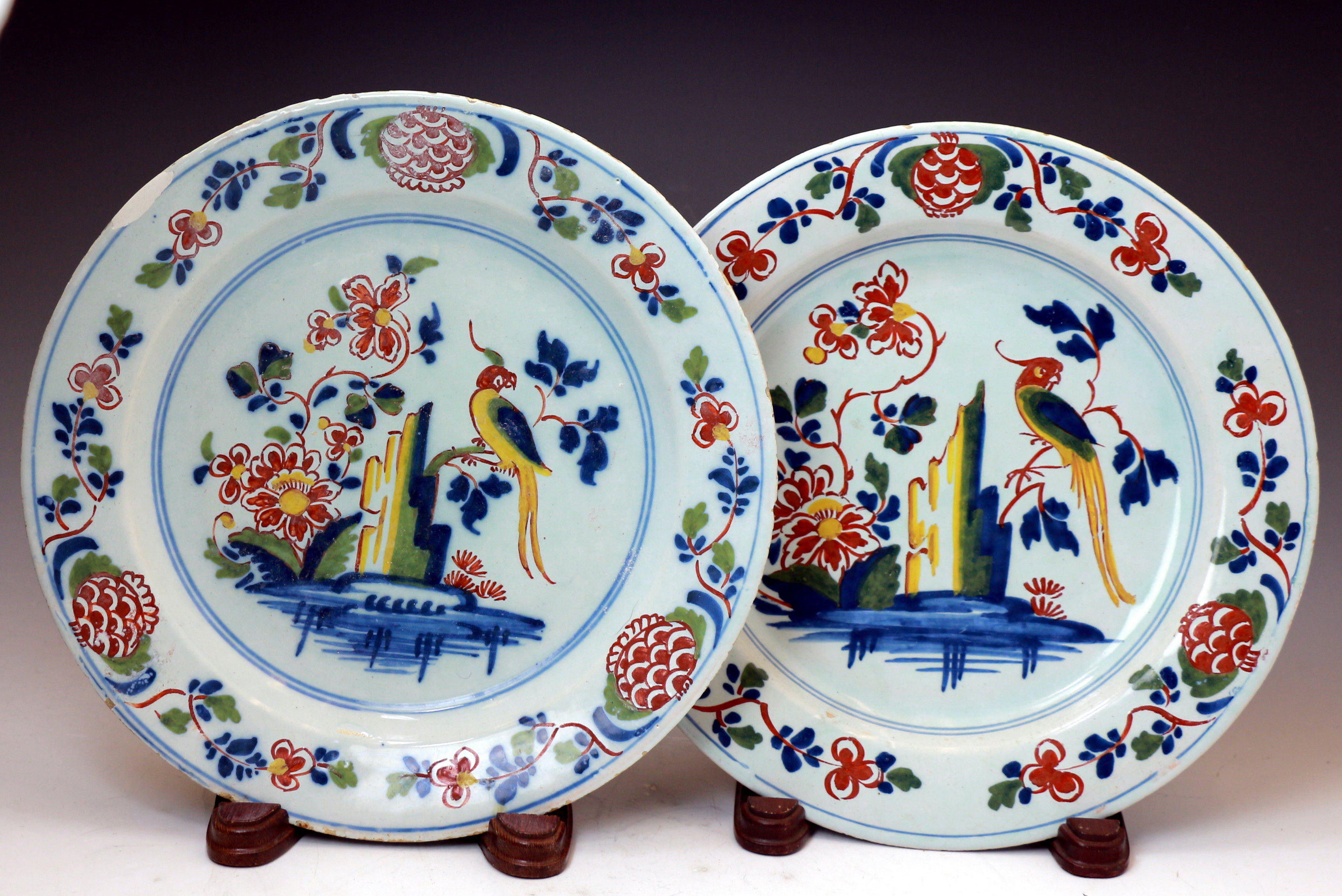 Pair of English London delftware polychrome coloured plates 18th century pottery