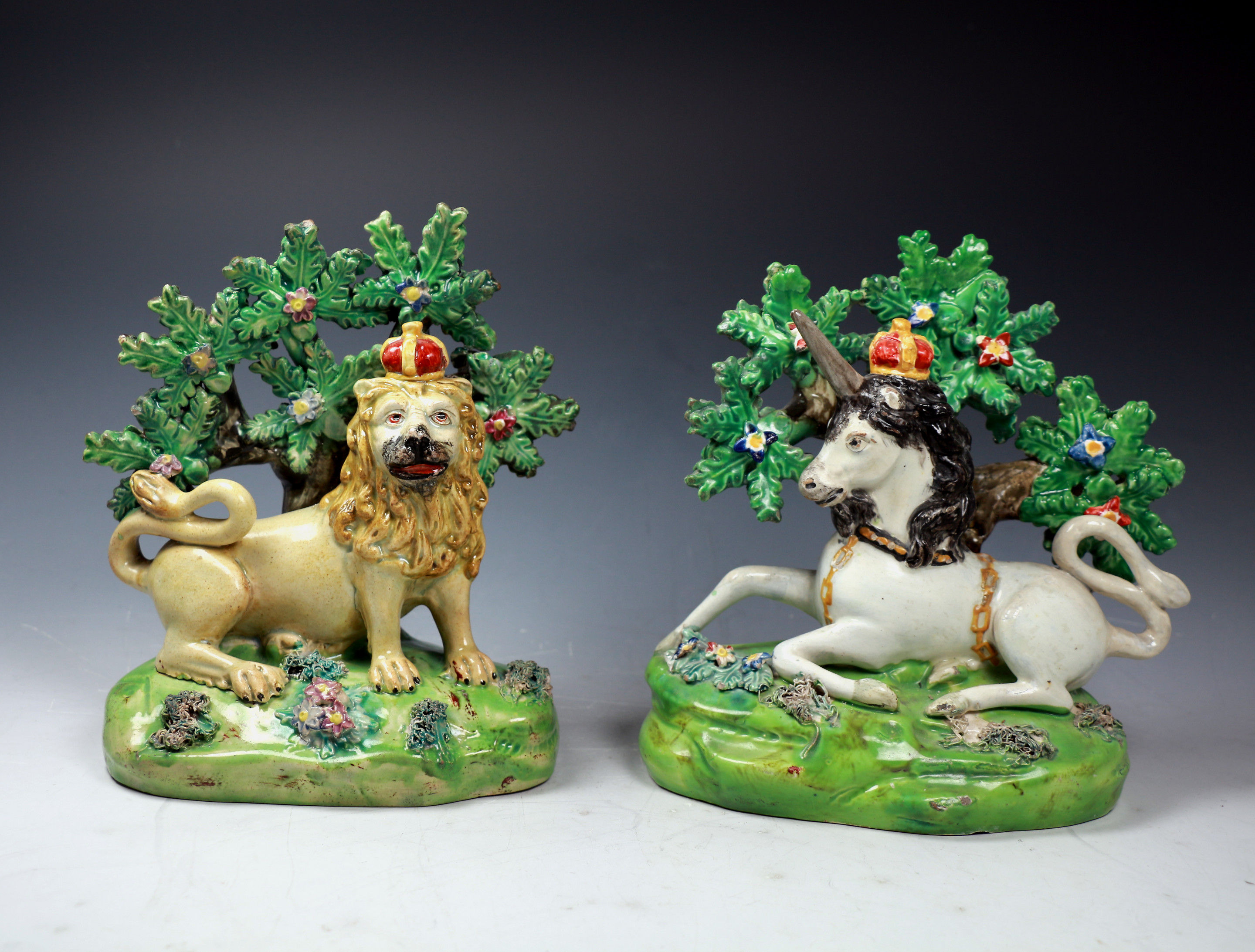 English Staffordshire pottery figures of the Lion and the Unicorn. Walton c1820