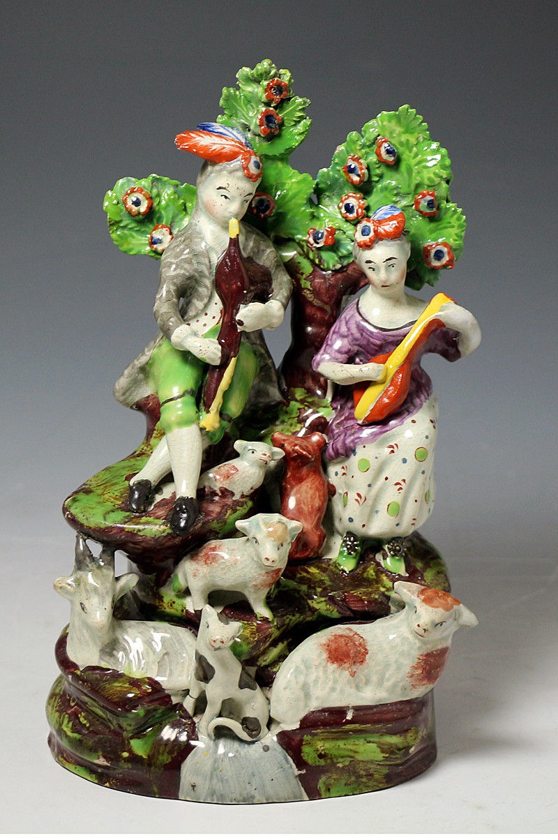 Antique Staffordshire pottery figure group of musical shepherds circa 1825