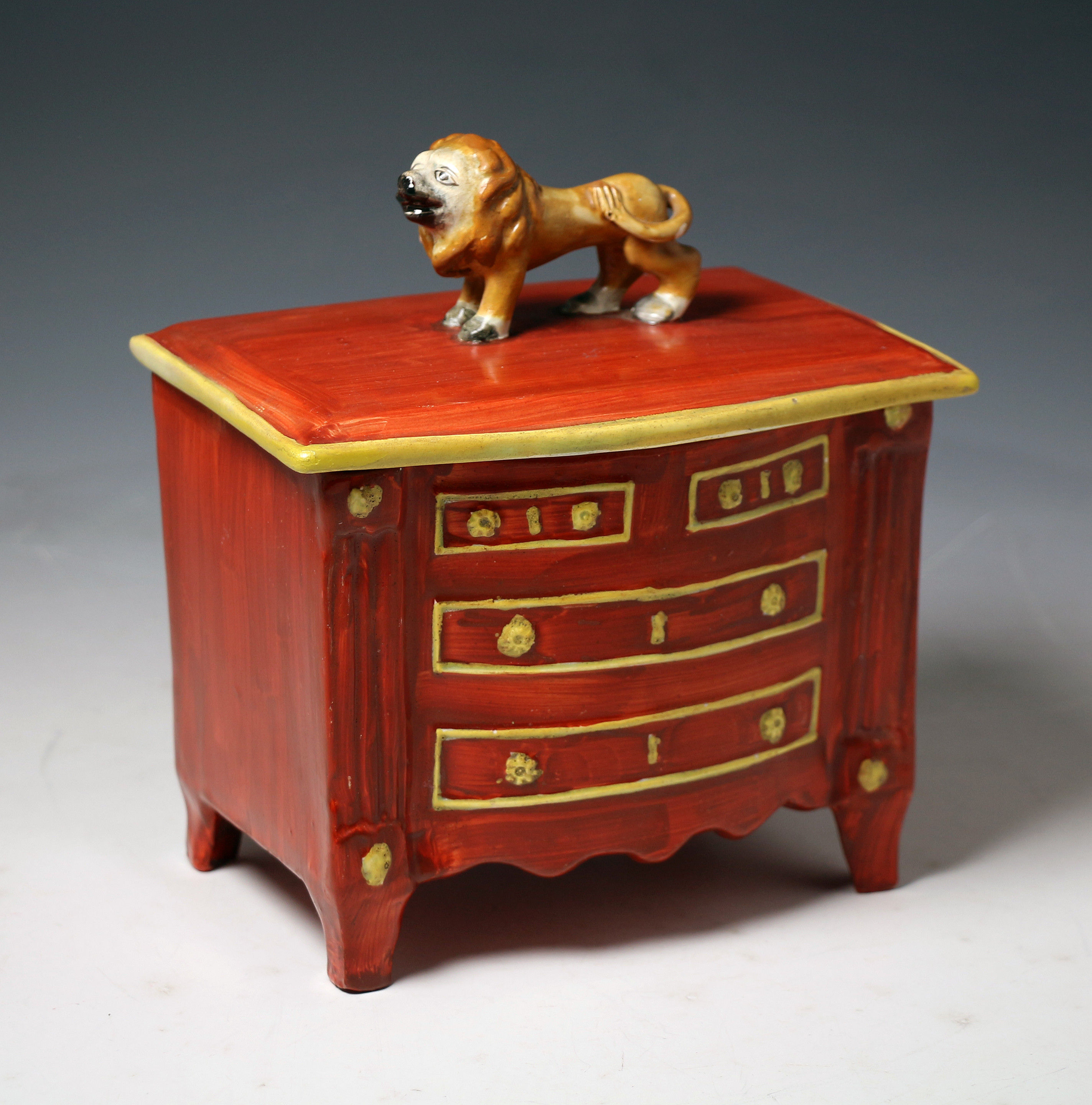 Antique Staffordshire pottery box with cover the finial the figure of a lion c1820