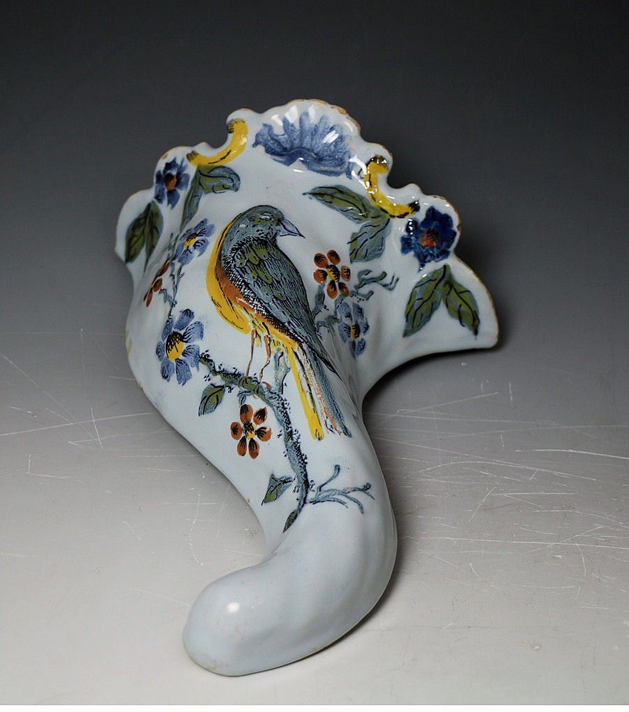 Antique English Delft ware wall pocket in polychrome with image of bird. Liverpool pottery c1740