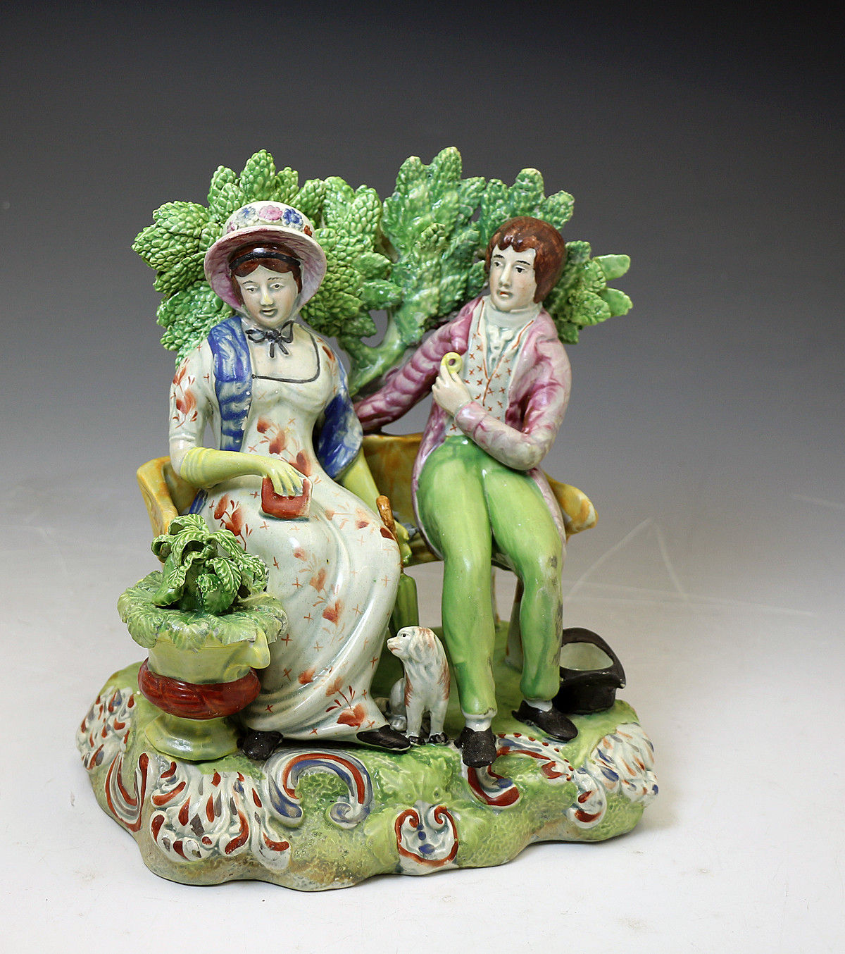 Antique Staffordshire pottery figure group known as 