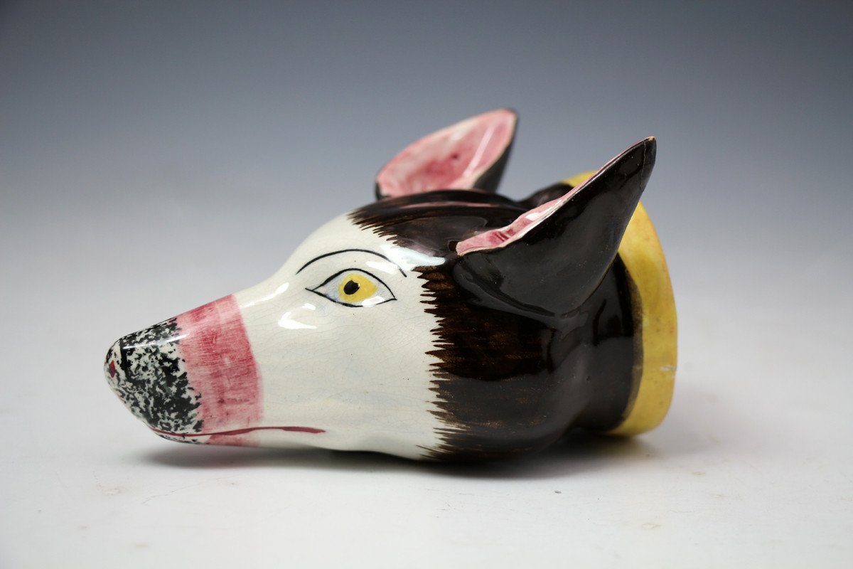 Antique pottery stirrup cup in the form of a foxes head early 19th century