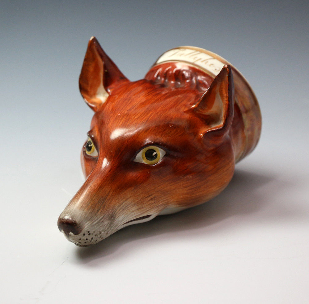 Antique Staffordshire figure head of fox stirrup cup Tally Ho.