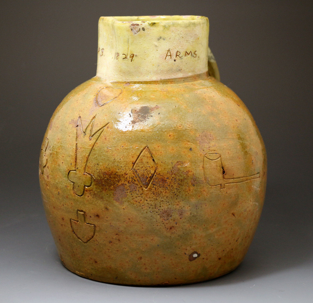 Antique English Devon pottery cider jug inscribed Farmers Arms and dated 1829