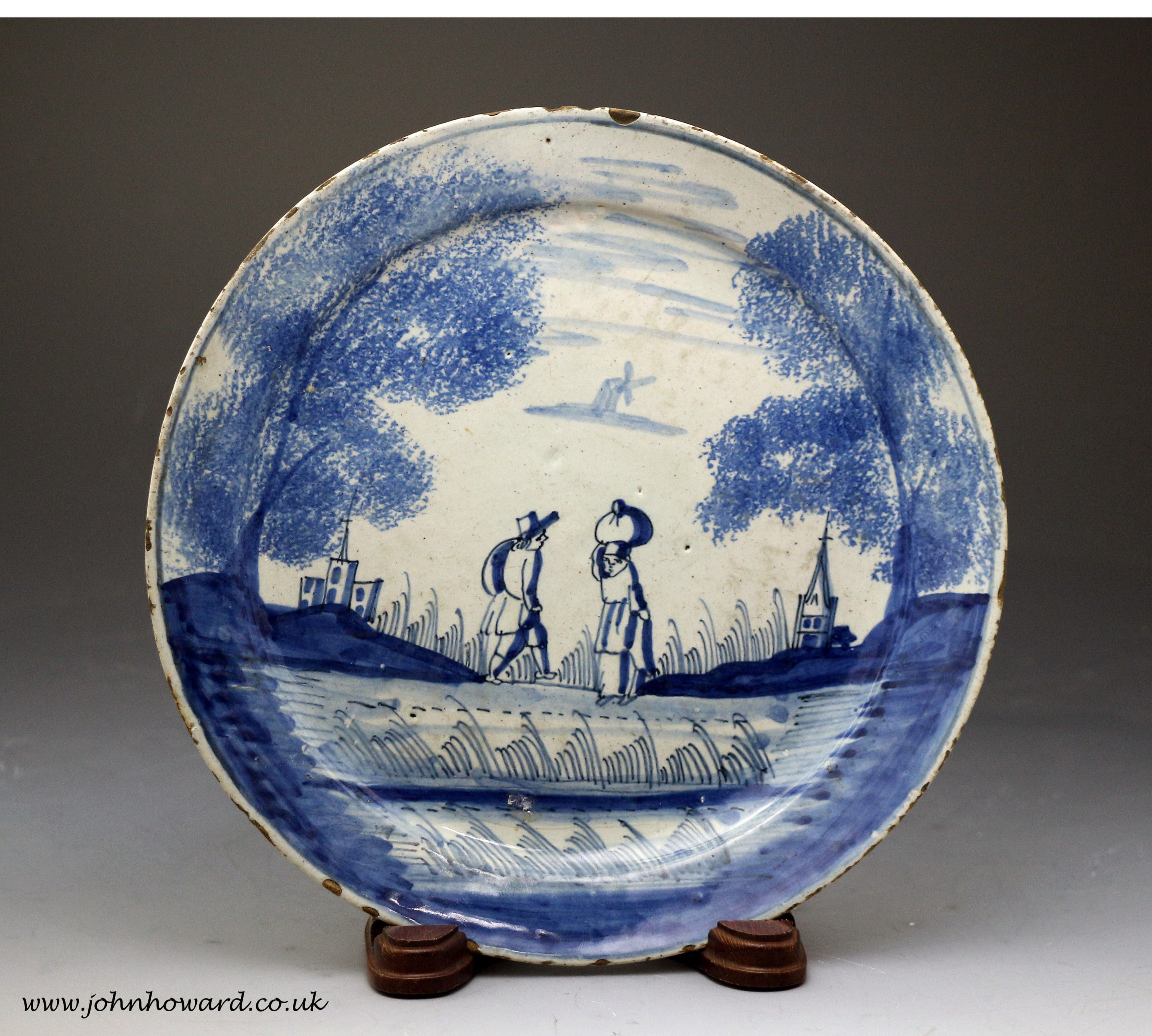 Antique  Delft earthenware plate in blue and white, 18th century period