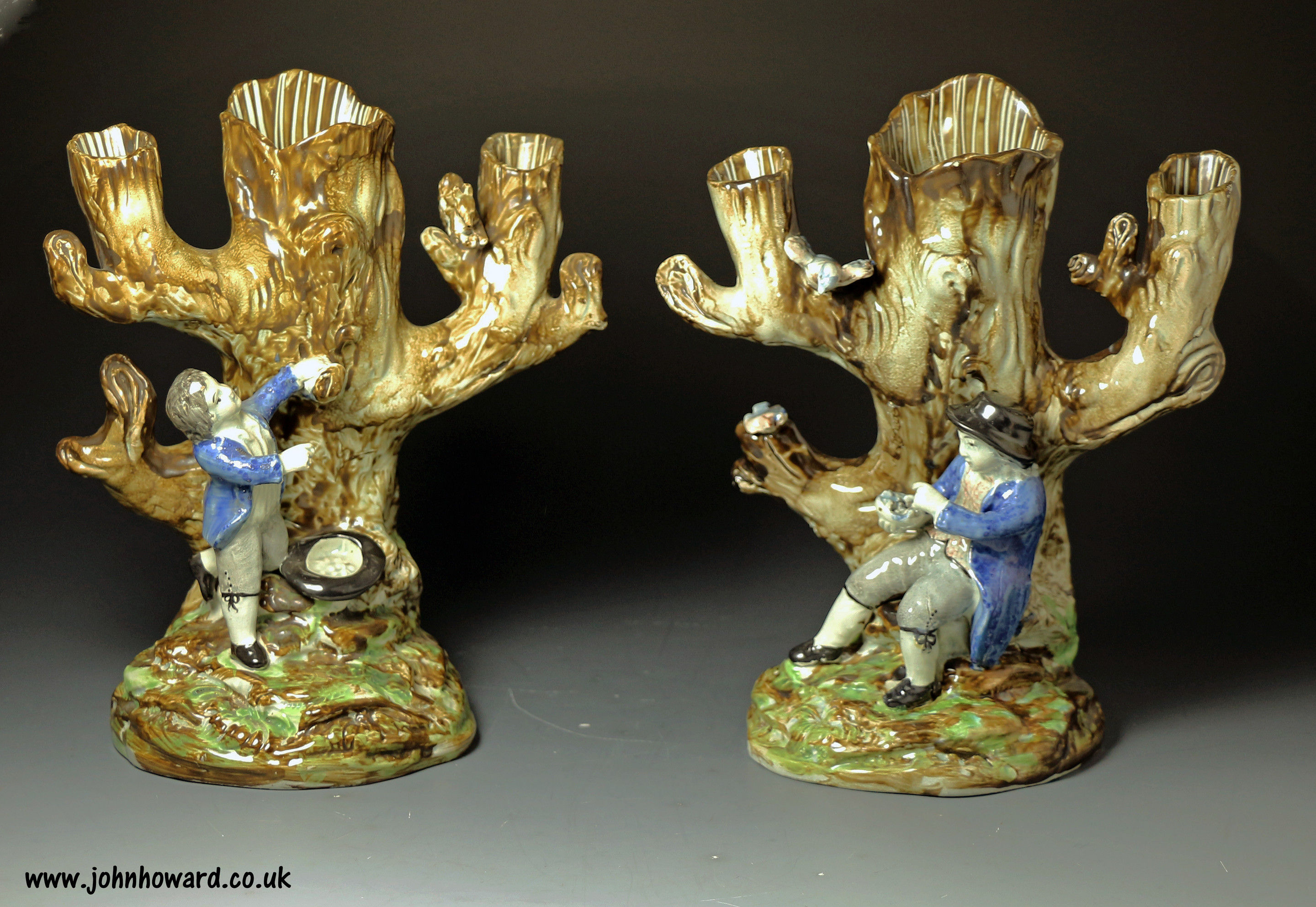 Antique Staffordshire pottery pair of Staffordshire figure groups in underglaze colors c1810