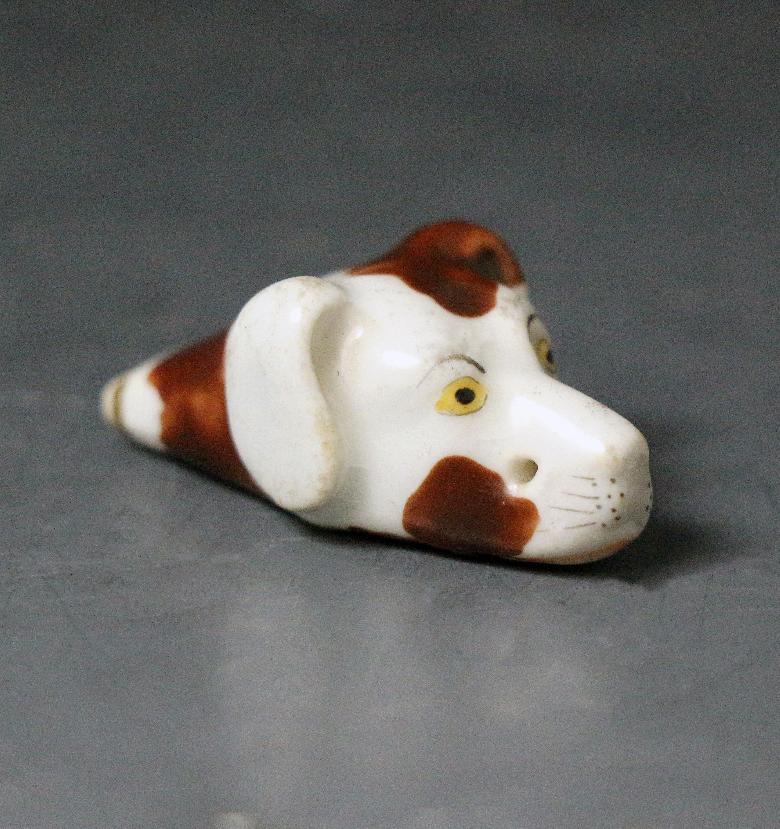 Antique Staffordshire porcelain hound head whistle c1865