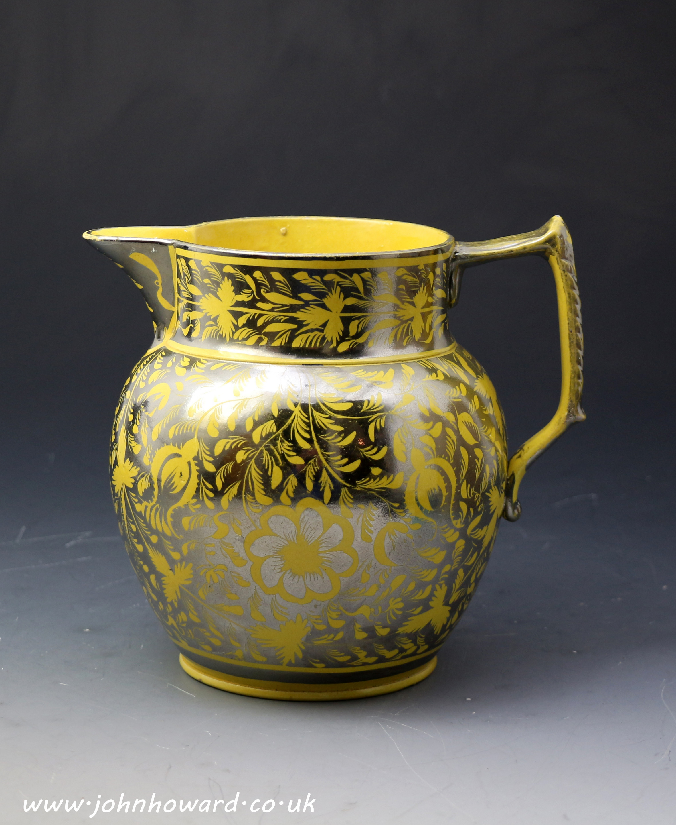 Antique British pottery silver luster resist decorated pitcher with a canary yellow ground circa 1820