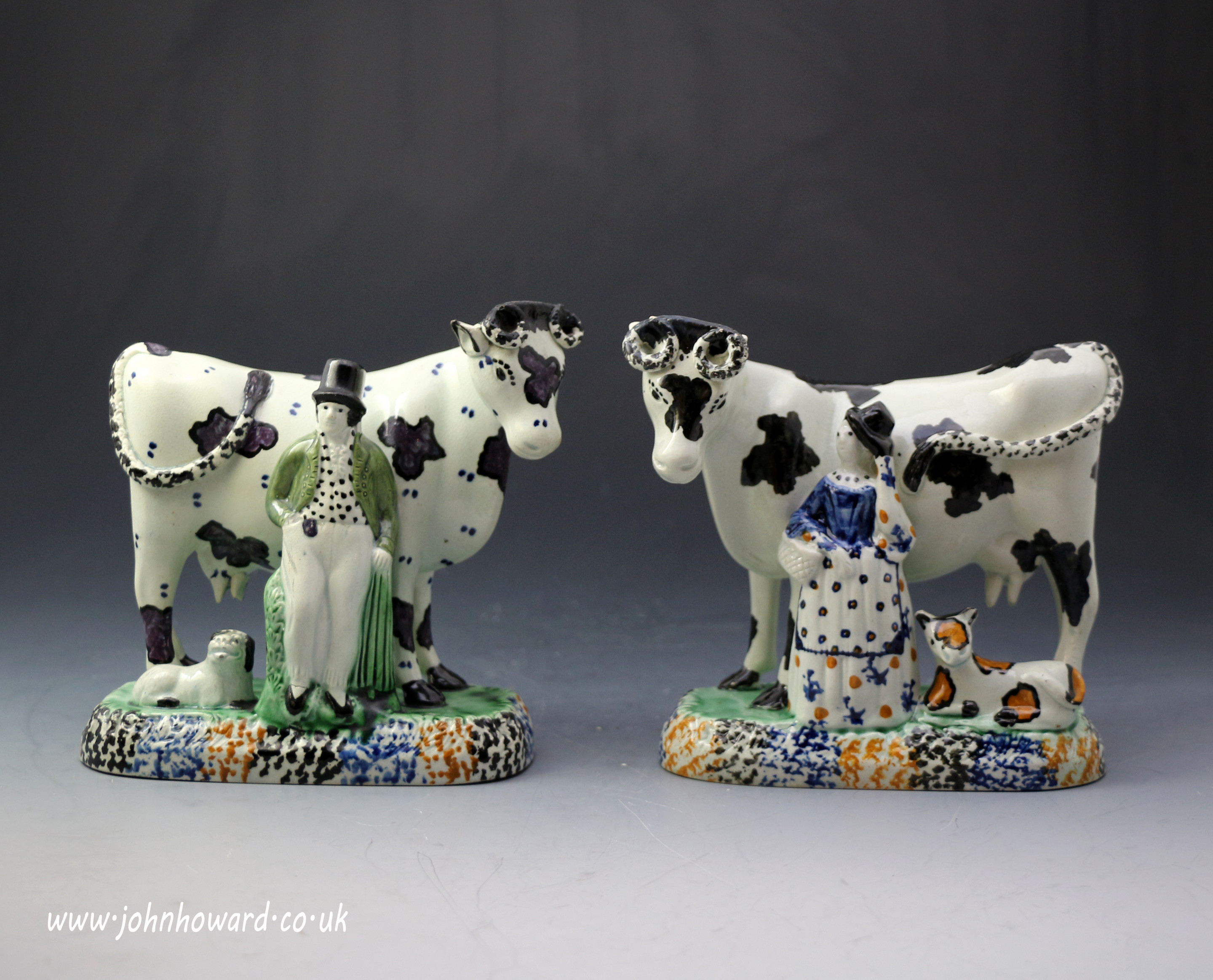 Antique pottery cows with attendents . Yorkshire pottery early 19th century