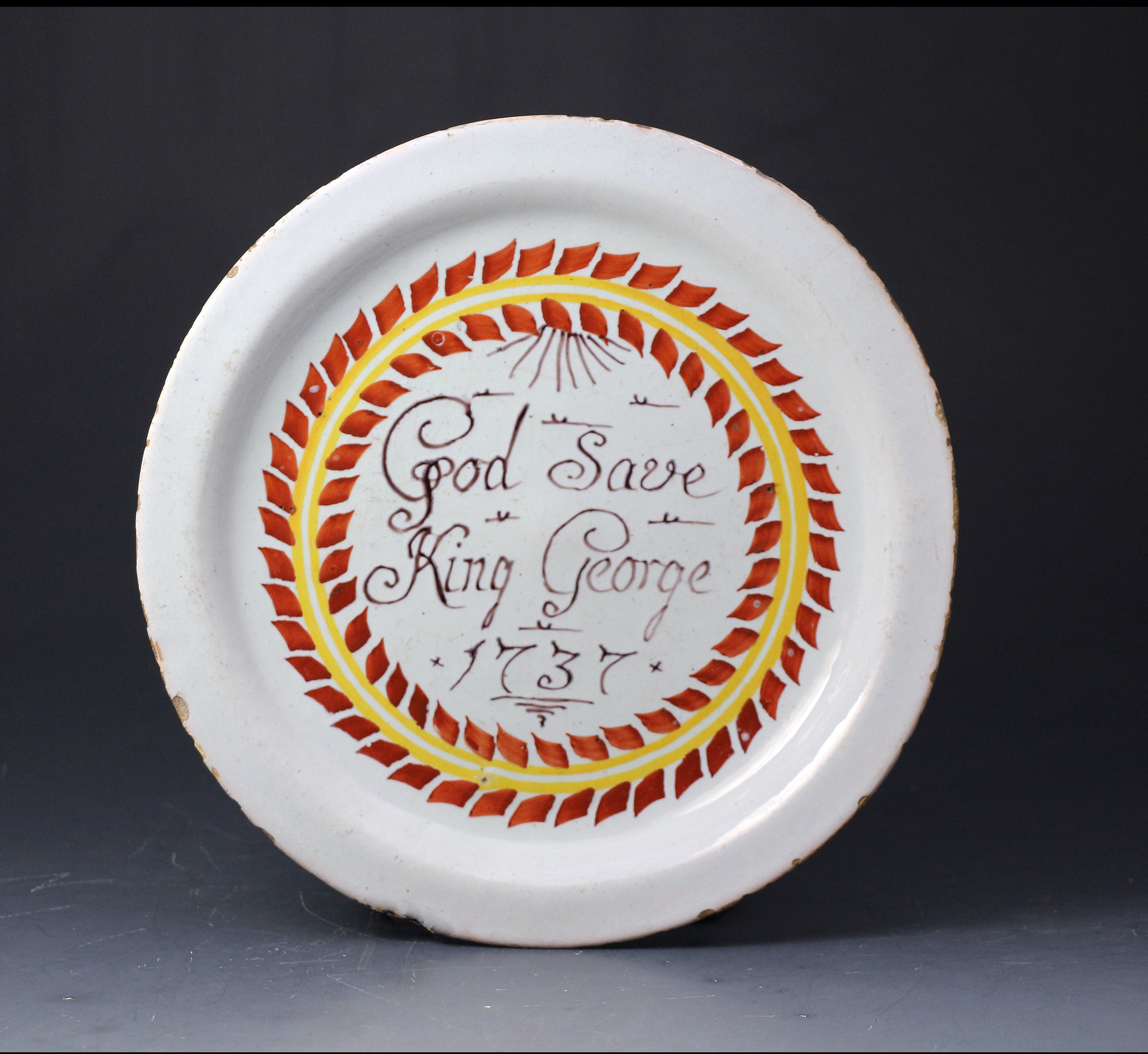 English delftware pottery plate with inscription and date 