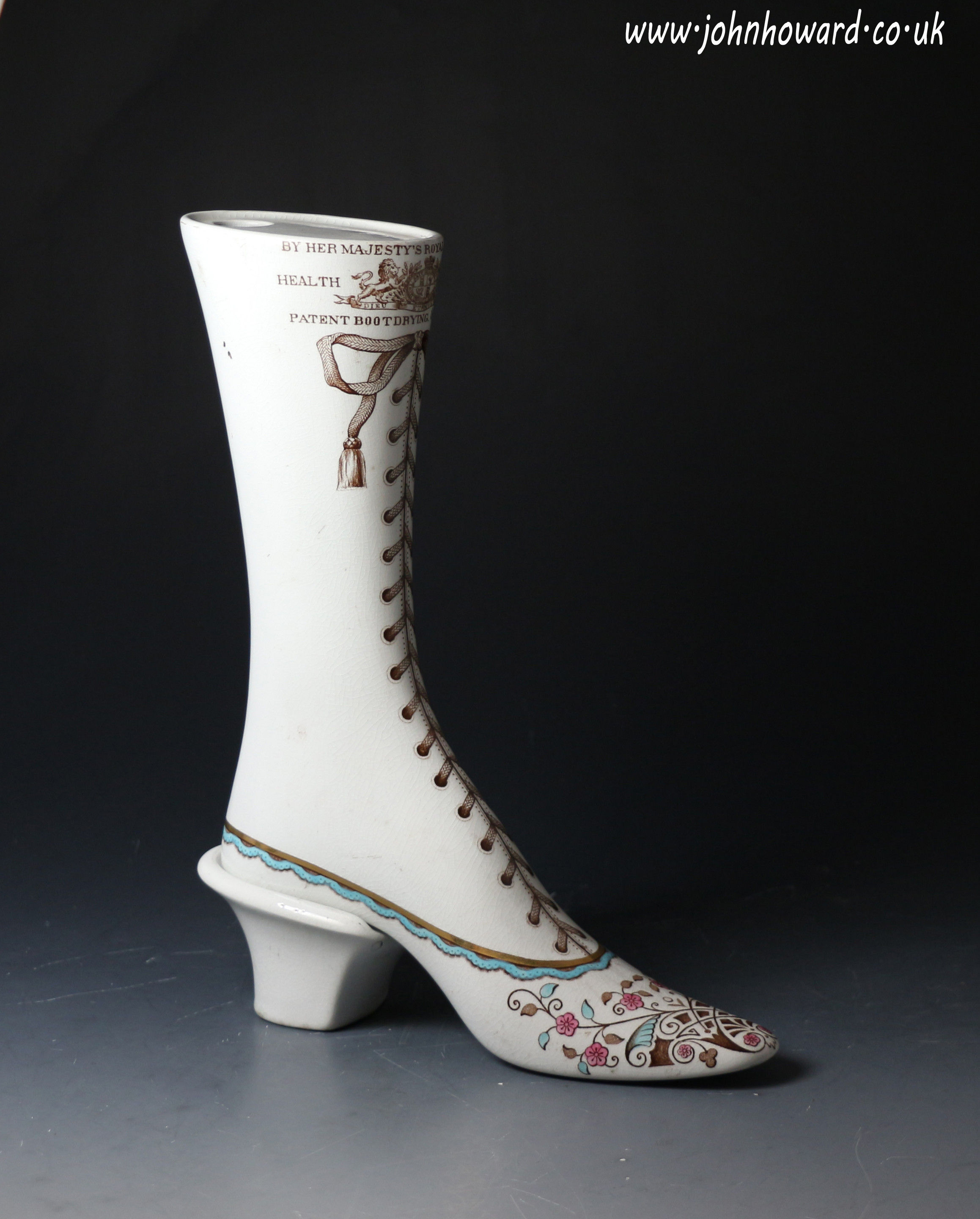 Victorian period pottery shoe warmer with Royal Patent mid 19th century