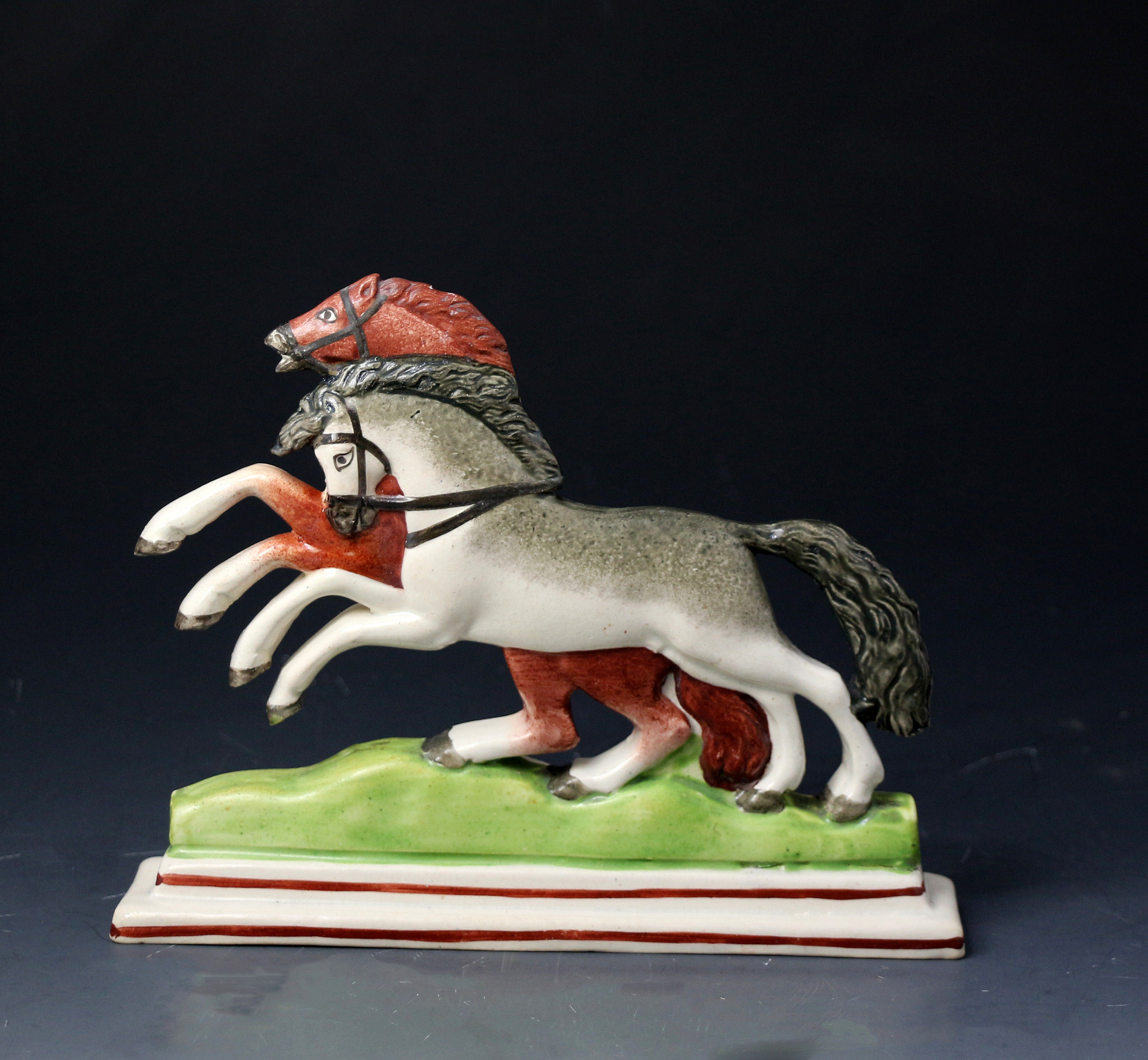 Antique pottery pearlware figure of two prancing horses, probably Swansea Pottery c1820