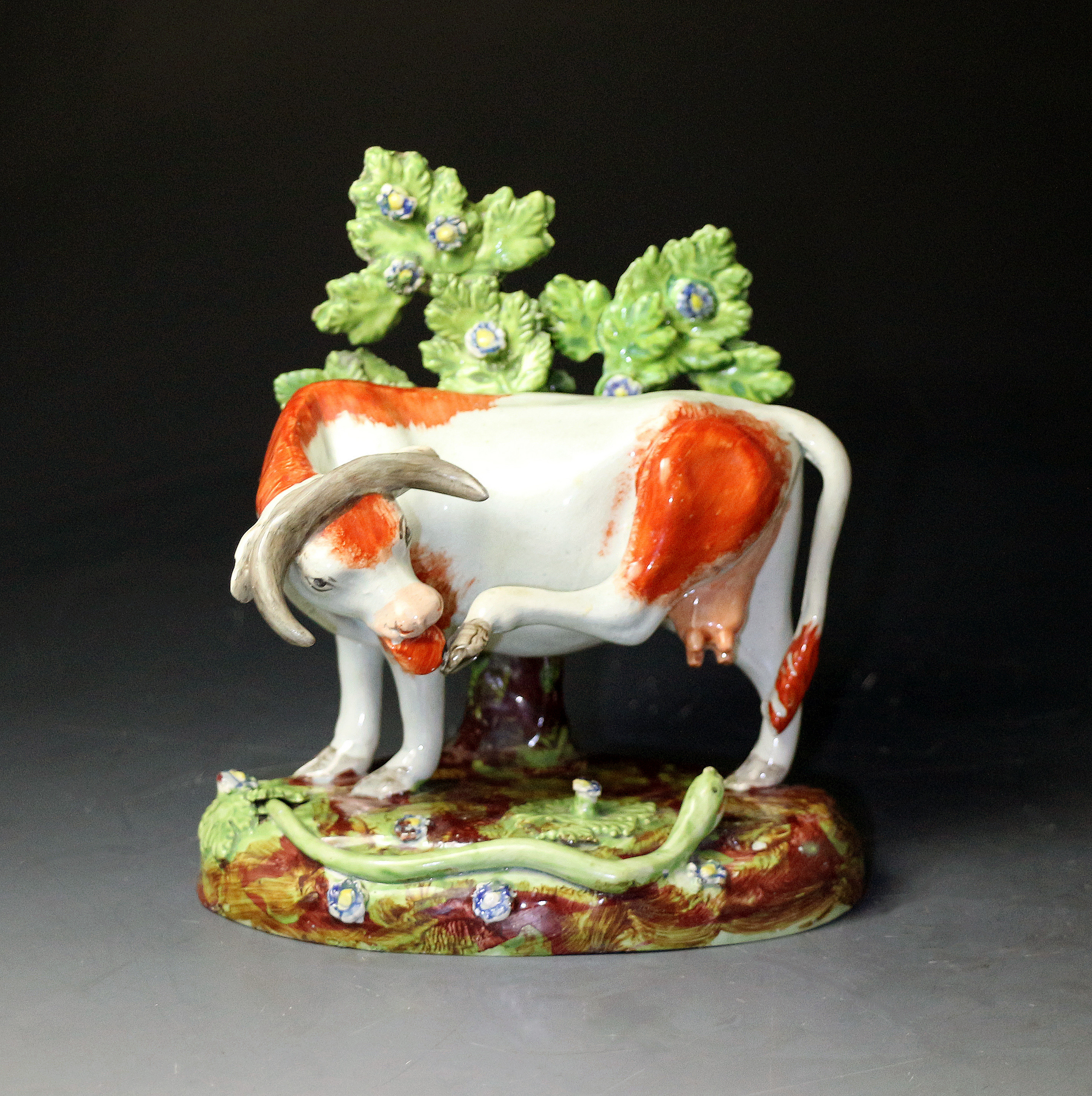 Antique Staffordshire pearlware pottery bocage figure of a cow circa 1820