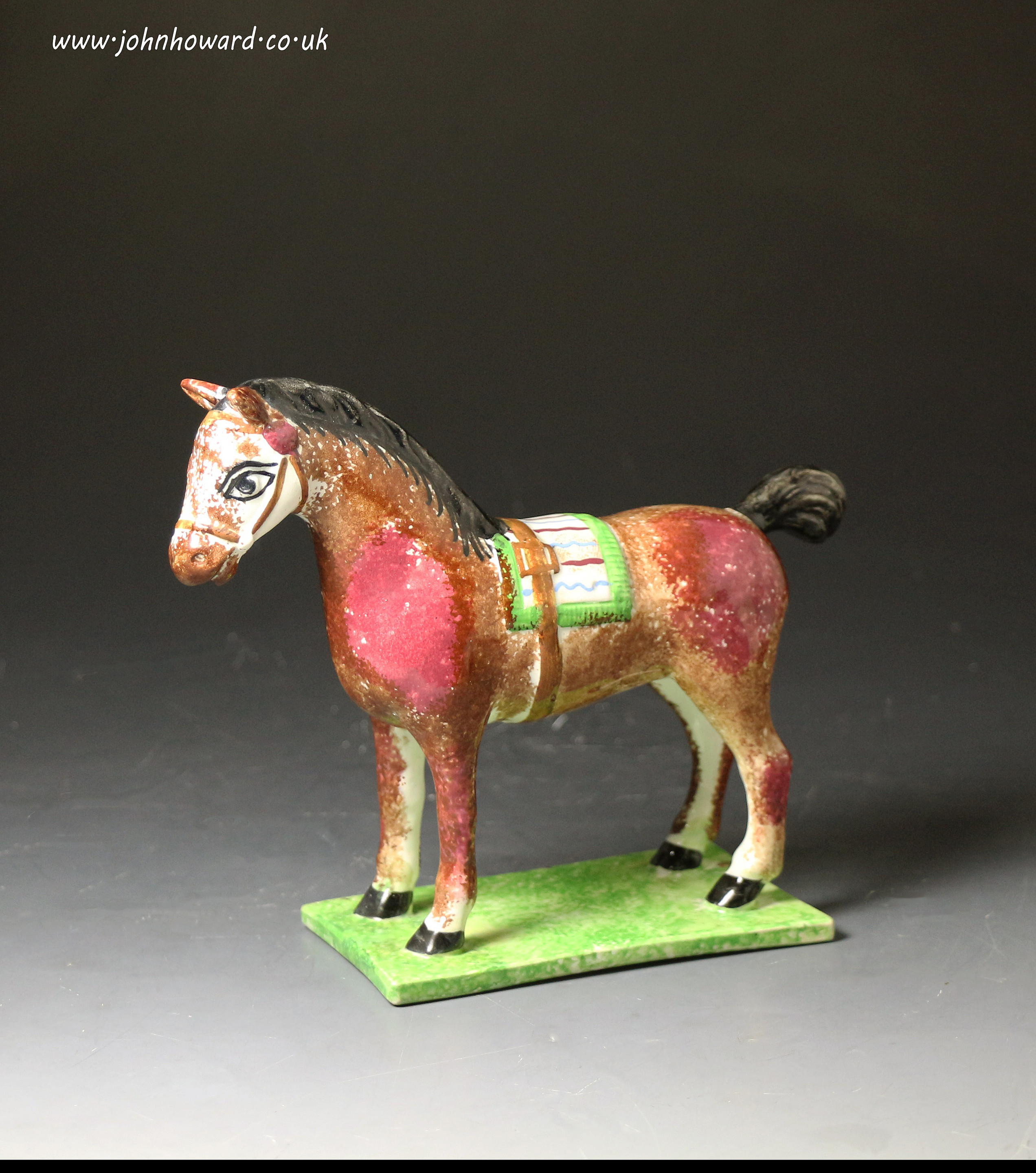Antique English pottery figure of a  horse on base circa 1810 period