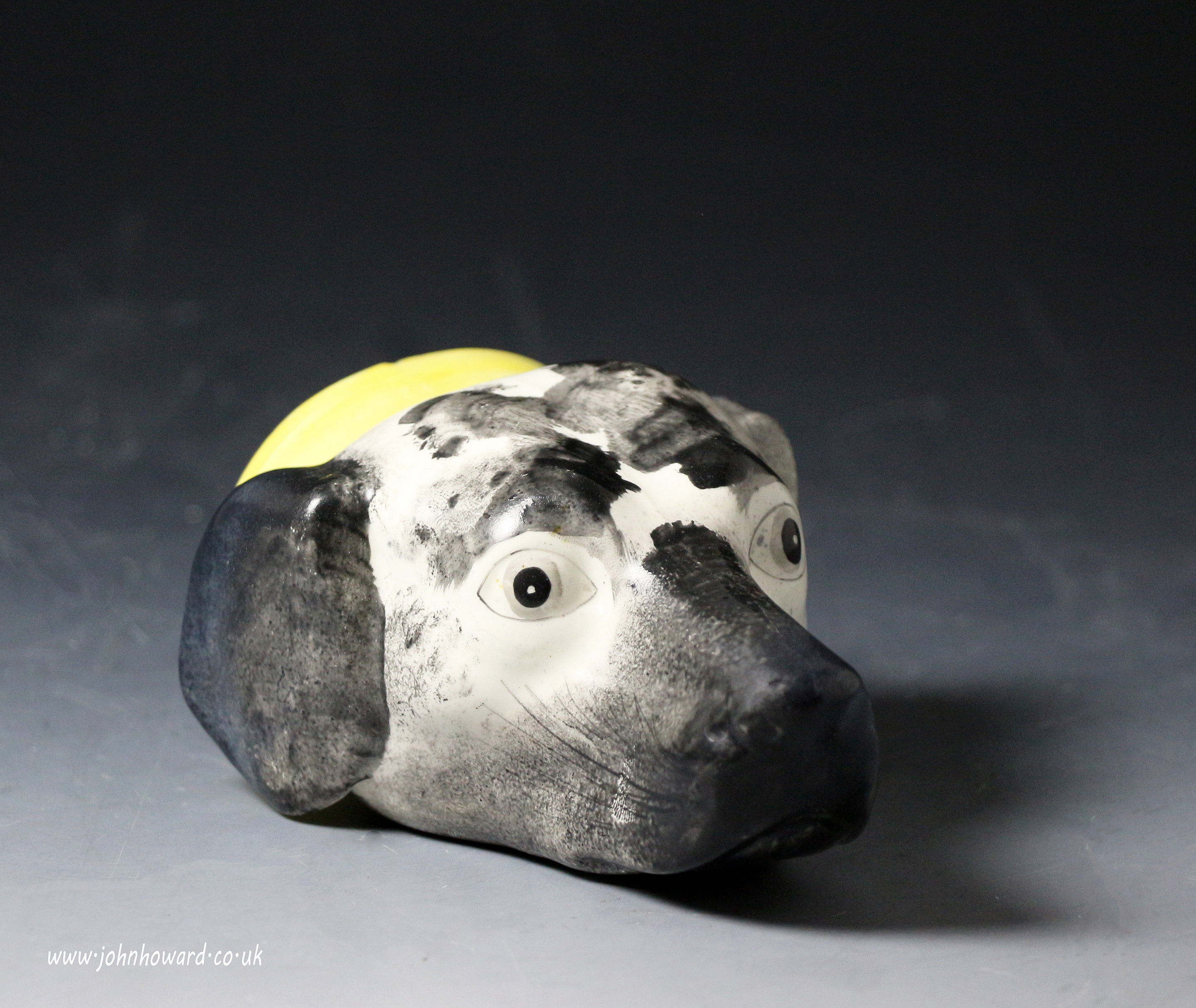 Antique English pottery hound head stirrup cup .Staffordshire  early 19th century