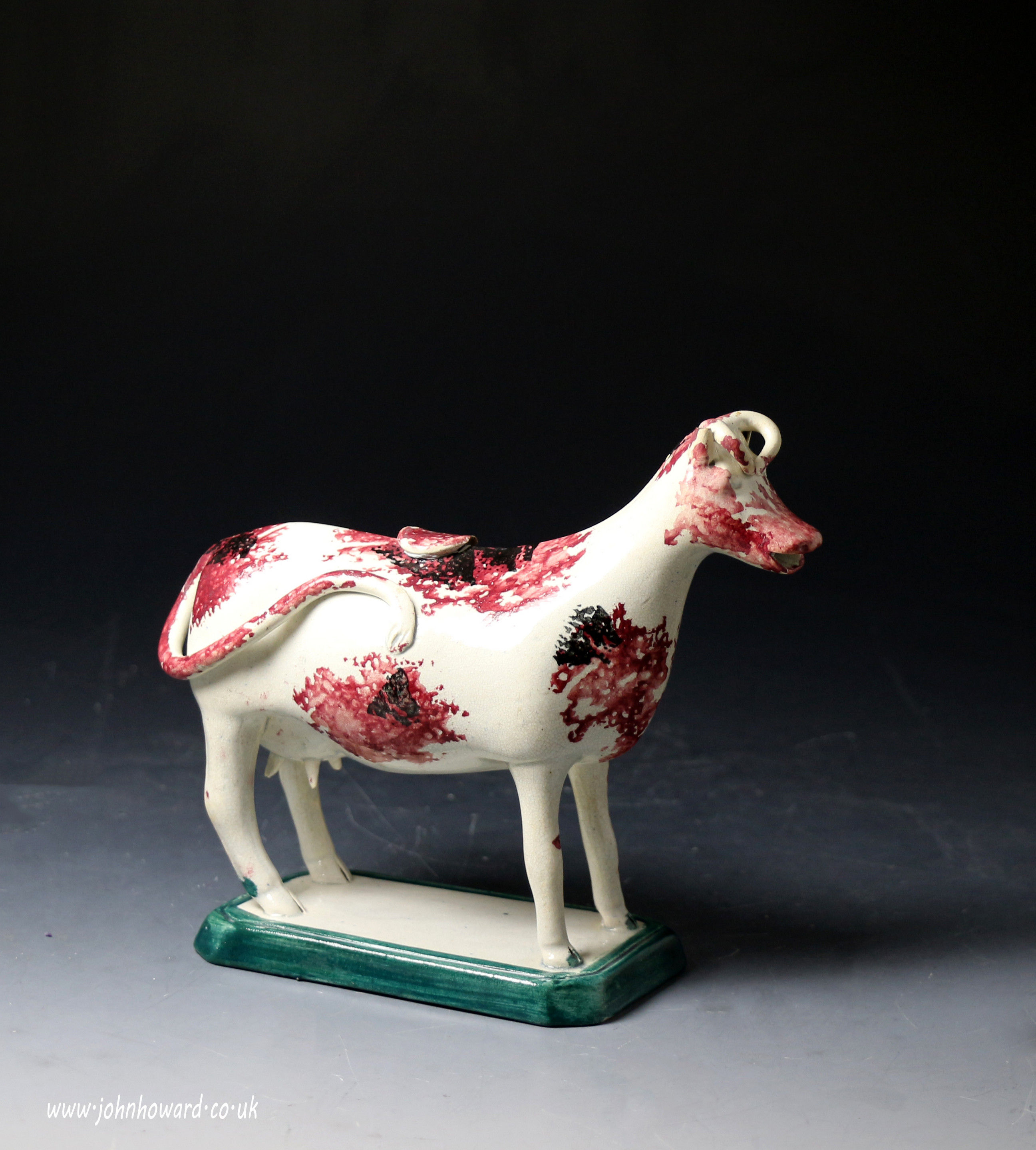 Antique English pottery figure of a cow creamer turn of 18th century