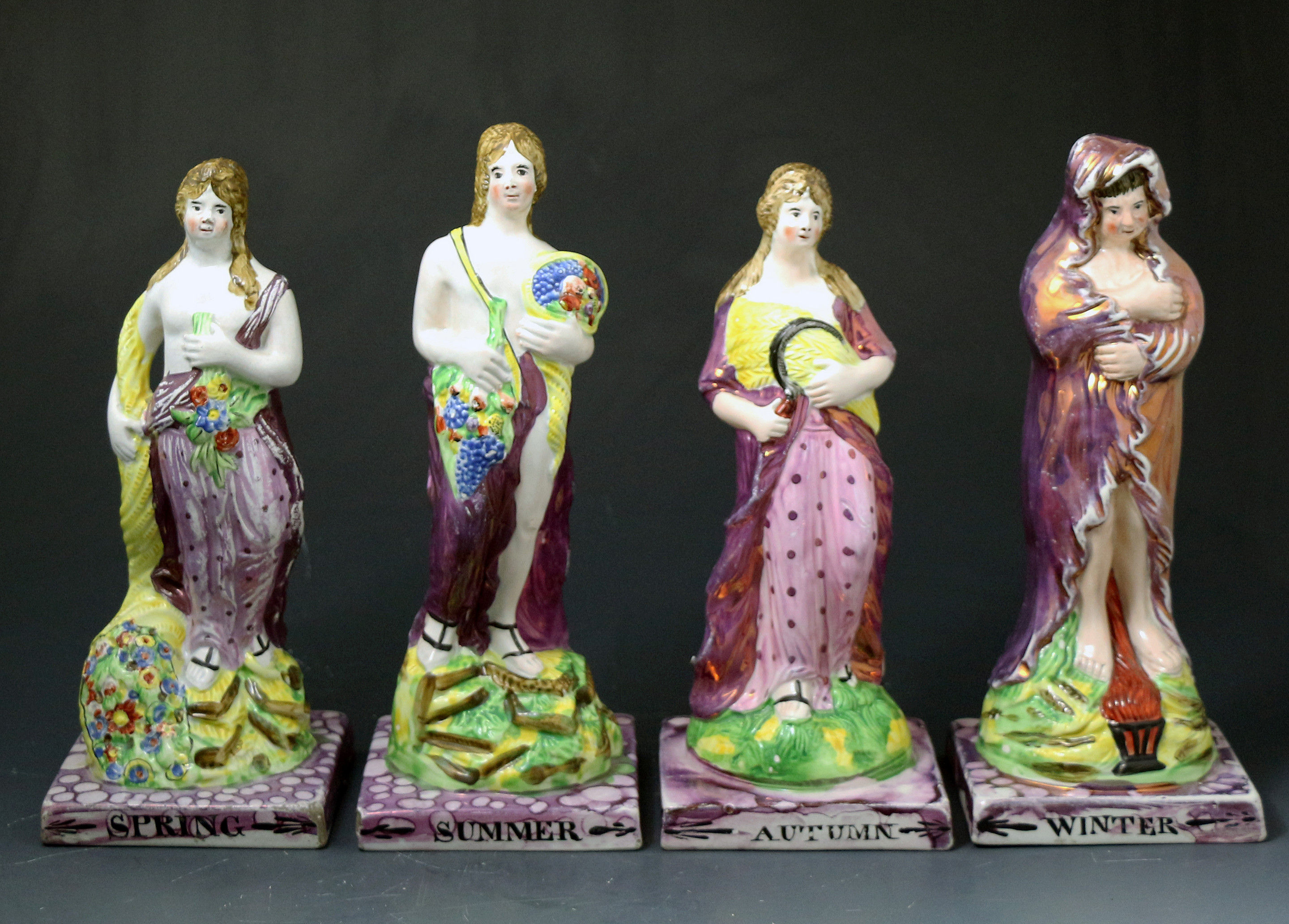 Set of the Four Seasons Figures in pink luster Dixon Austin Pottery North East England ealry 19th century