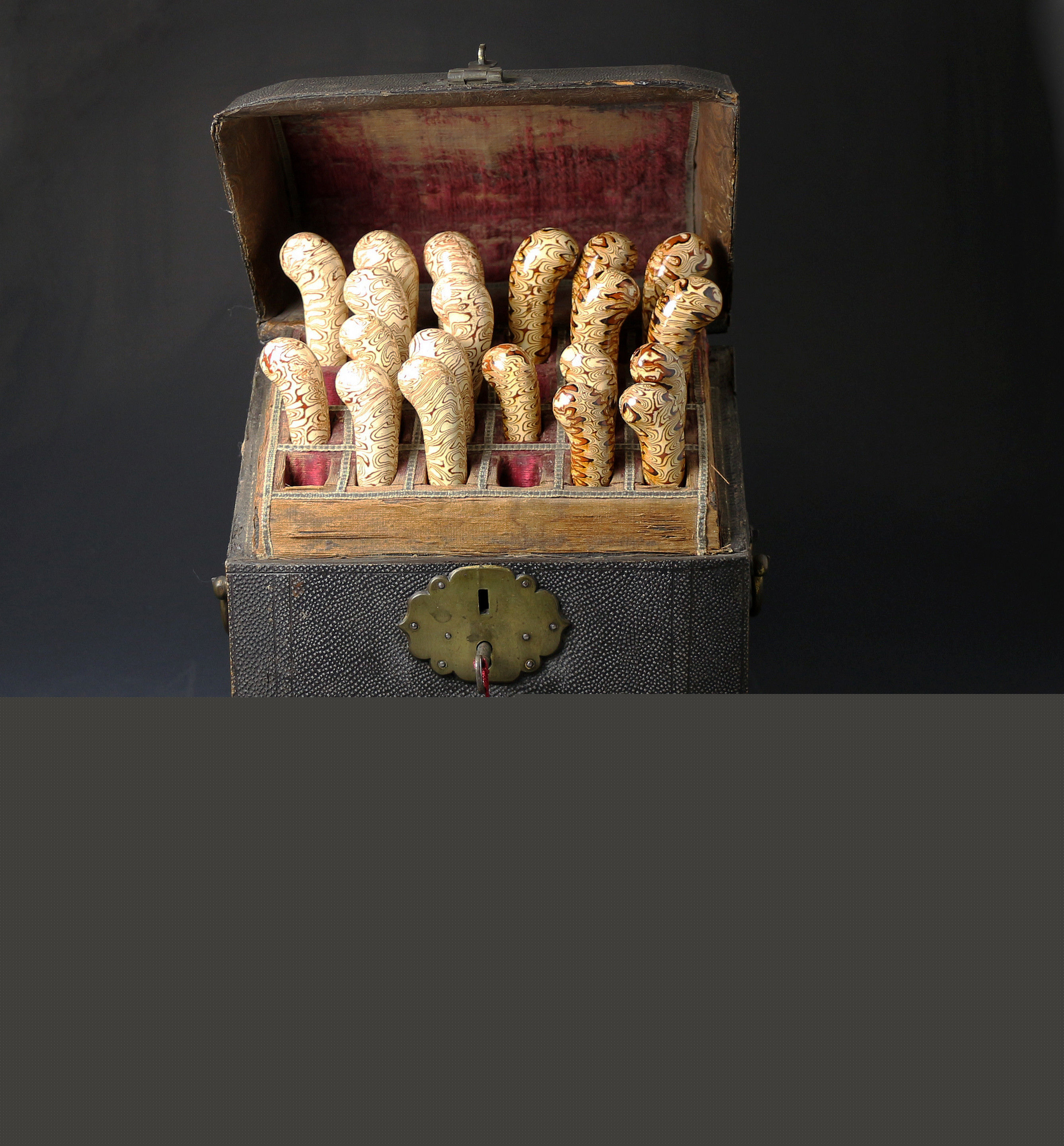 Mid 18thc cutlery box with two complete sets of agateware pottery knives and forks in the manner of Whieldon Staffordshire.
