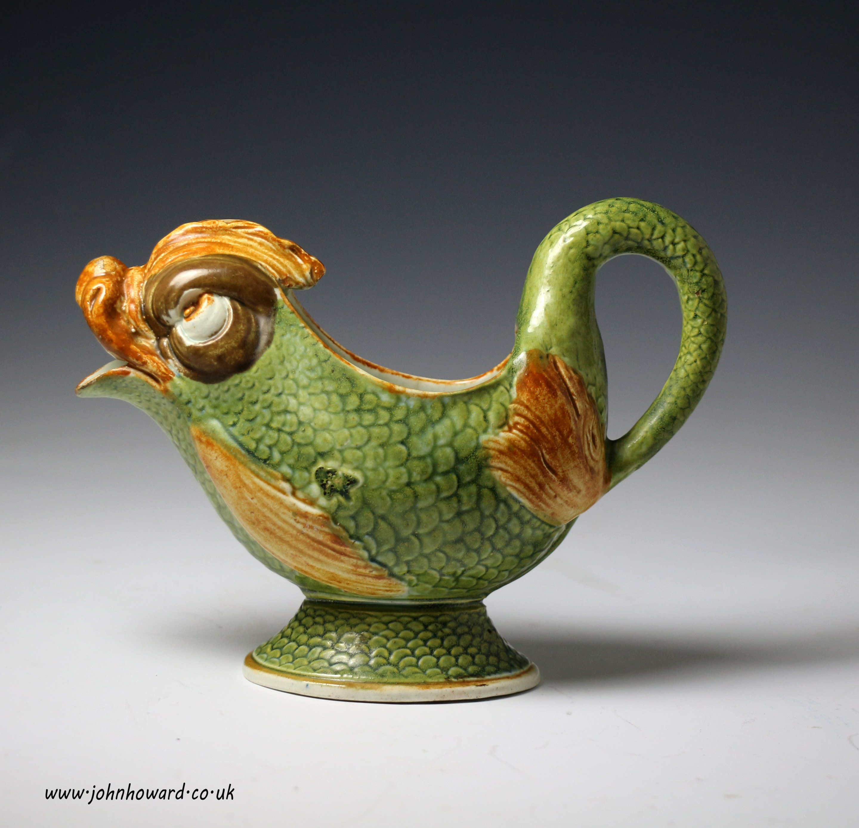 Antique English pottery prattware sauce boat in the form of a dolphin c1800