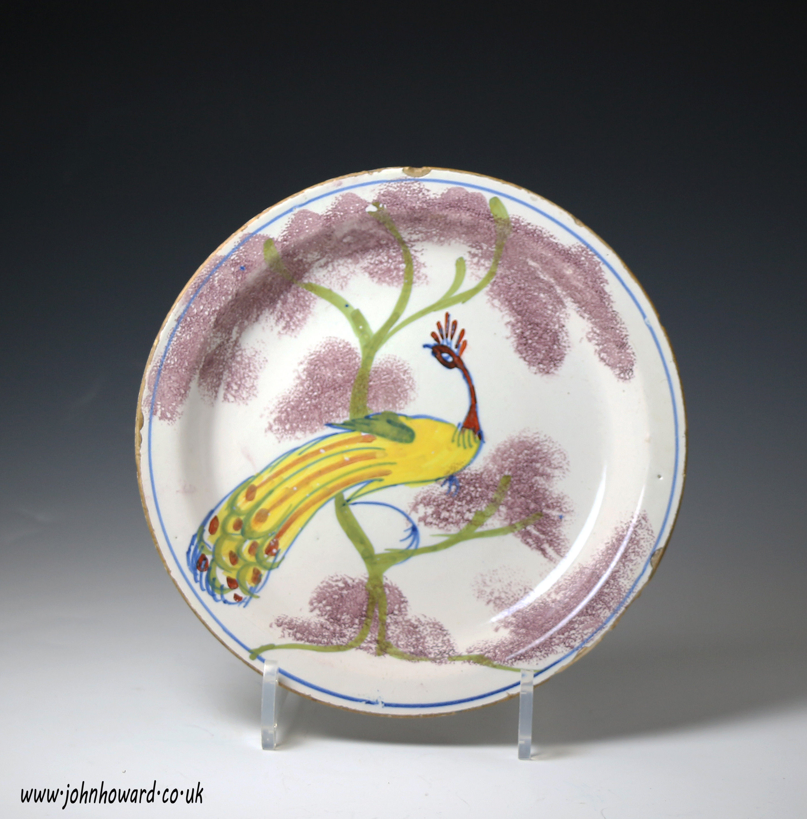 English delftware farm plate with peacock in tree Bristol  circa 1725