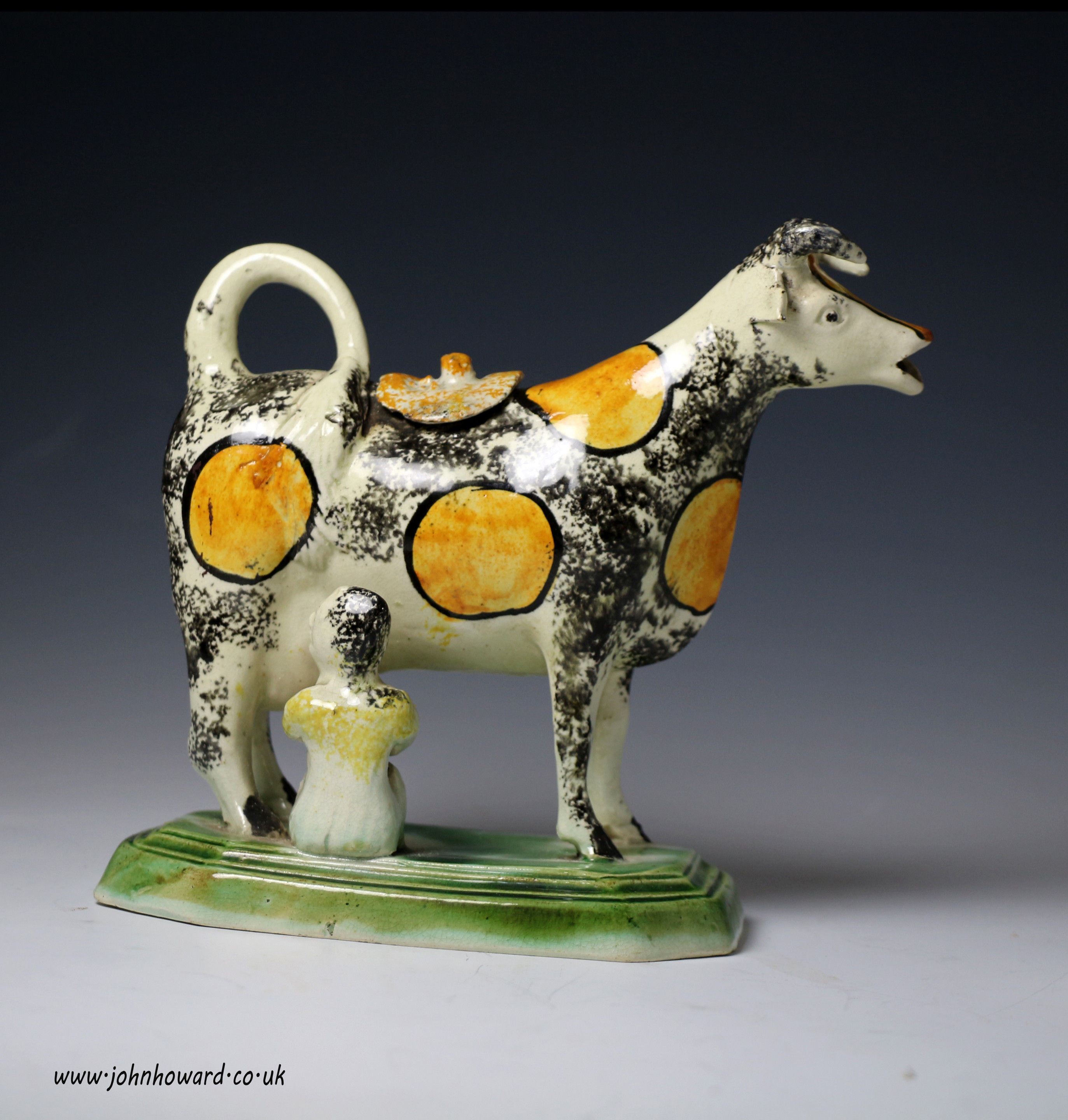 Antique English pottery cow creamer circa 1800-10 period.