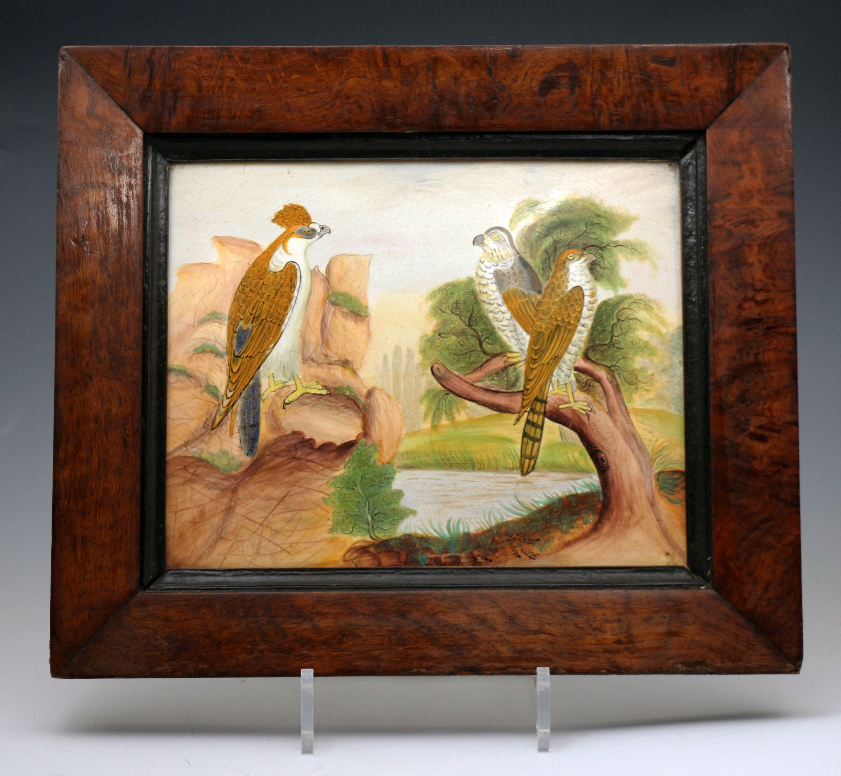 Pair of Staffordshire pottery framed pearlware plaques with paintings of birds of prey early 19th century