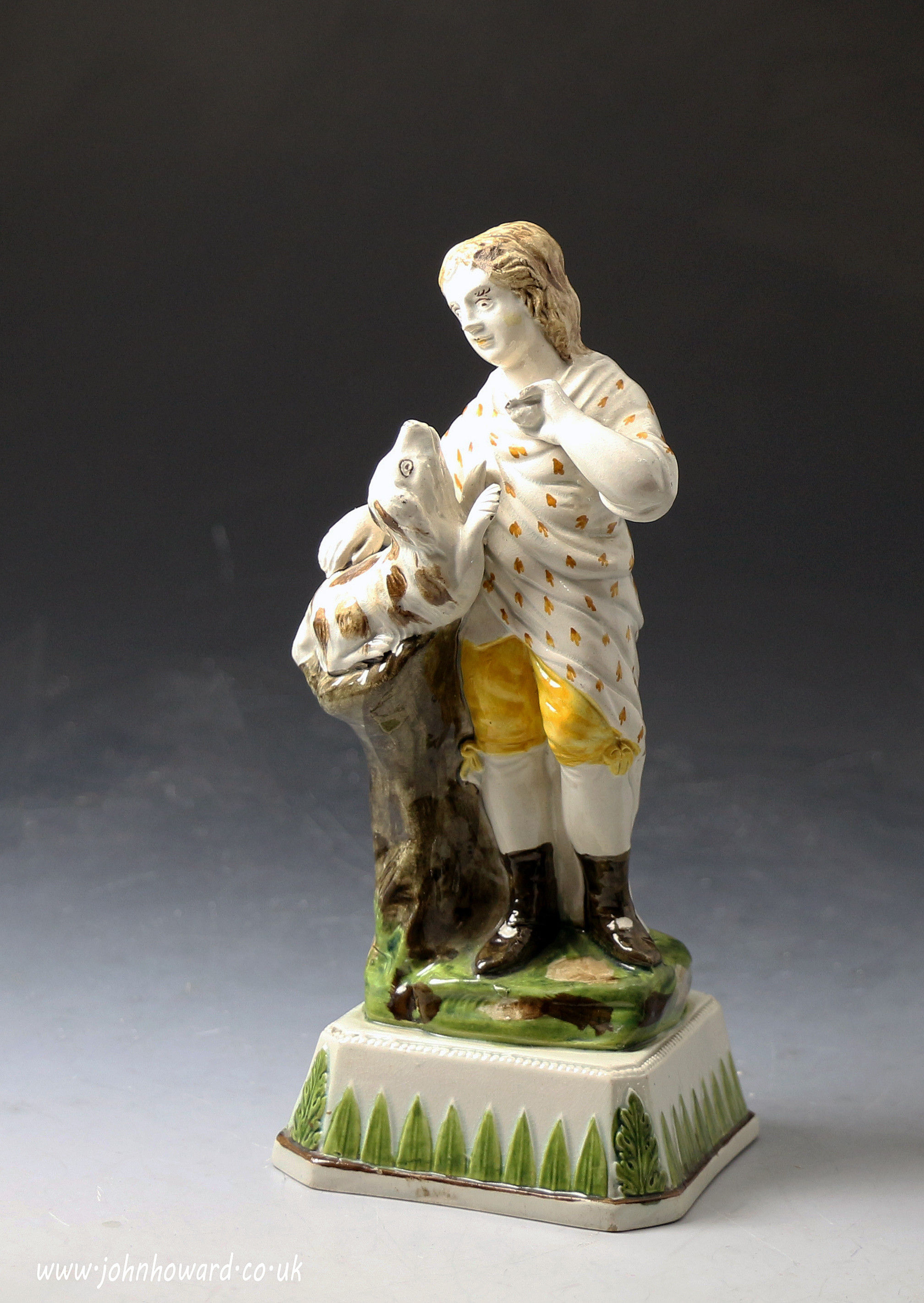 Antique English pottery prattware figure of a boy with dog .Staffordshire 