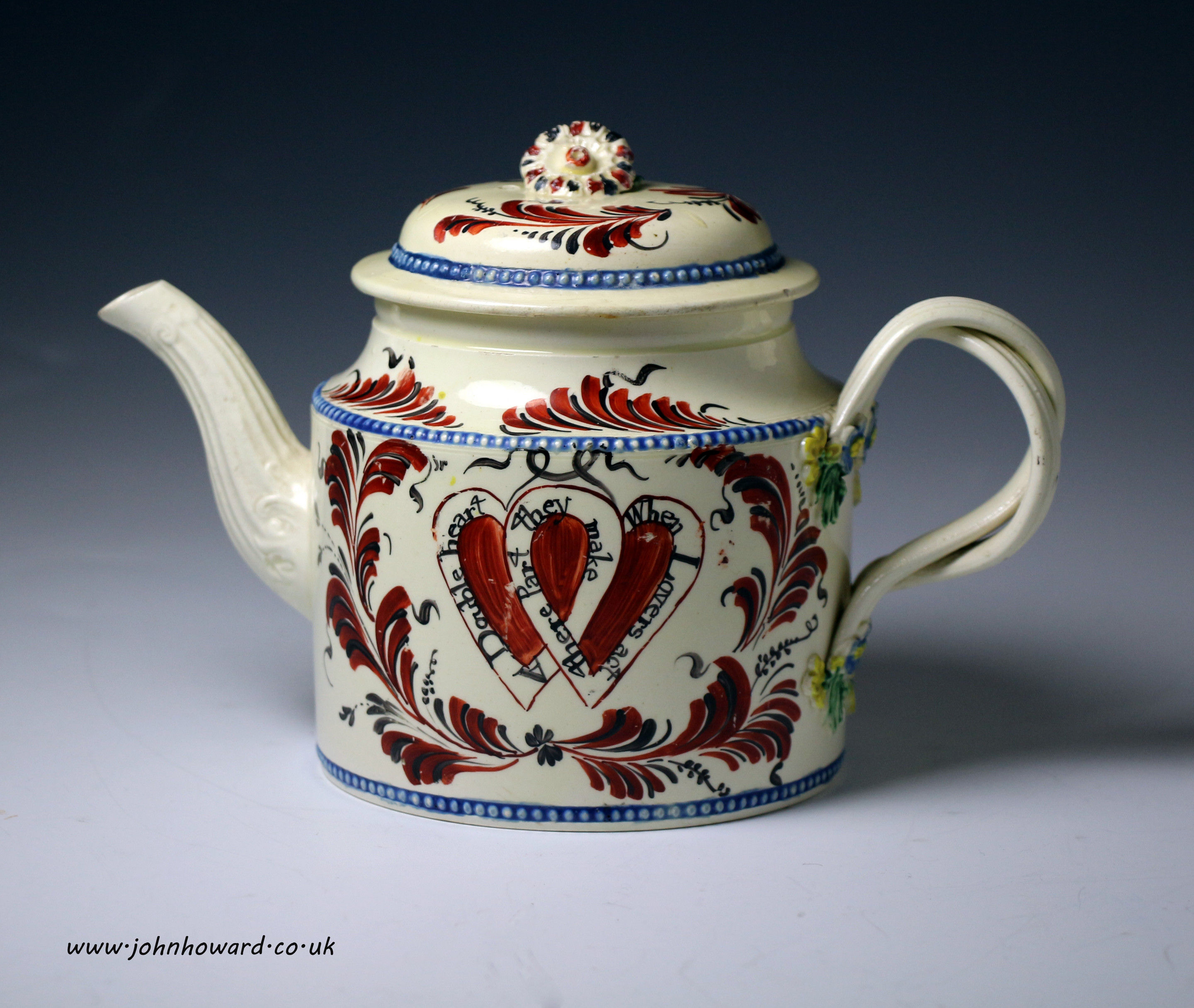 English creamware pottery teapot with heart motif and inscription c1775