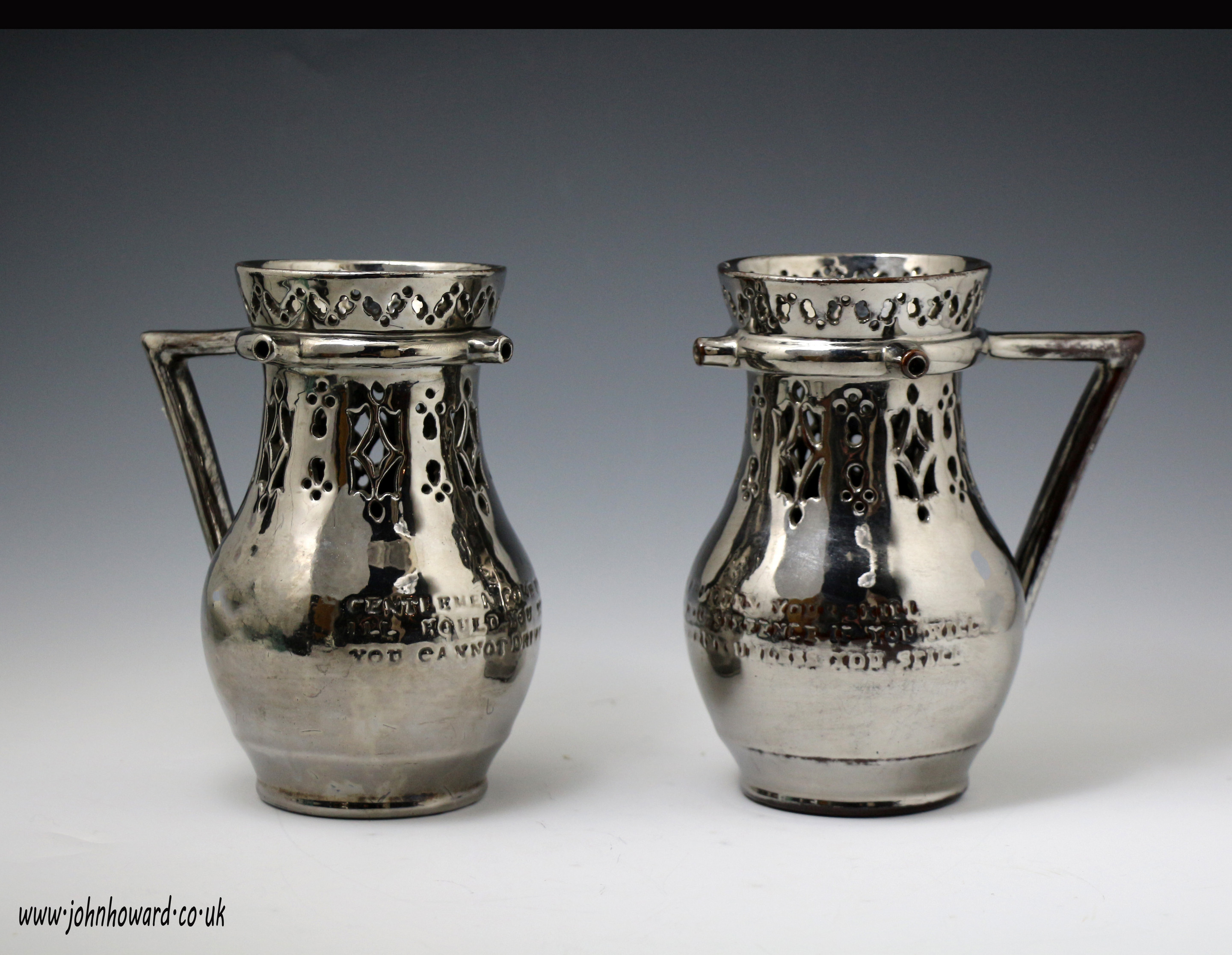 Pair of silver lustre Puzzle jugs early 19th century