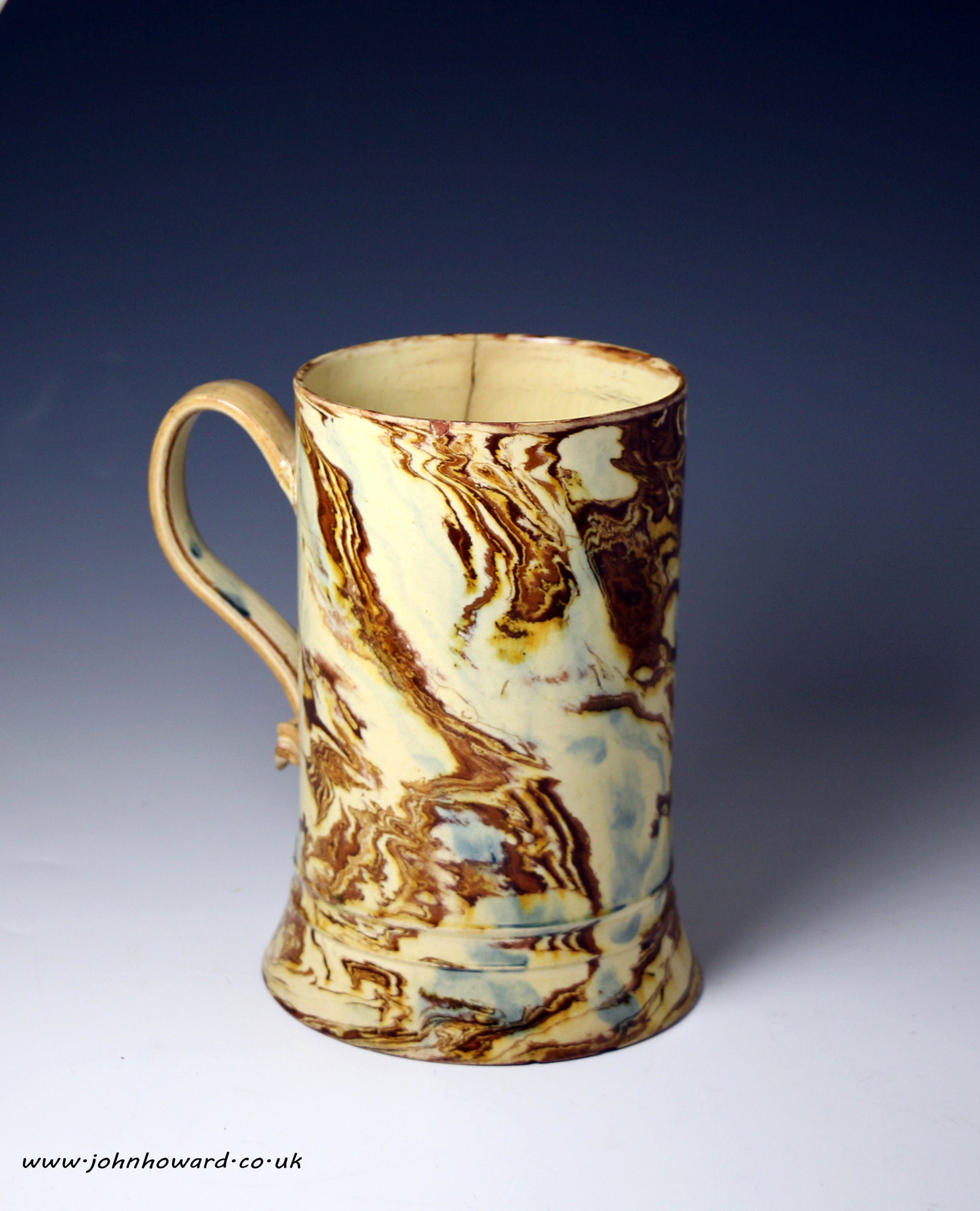 Earlysurface decorated agateware pottery tankard mid 18th century Staffordshire English                                                                            