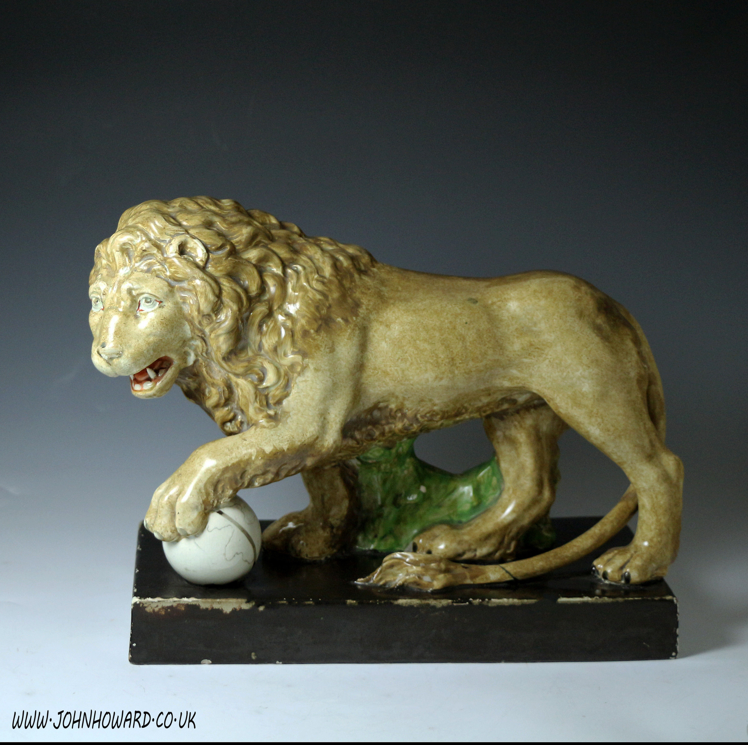Staffordshire pottery pearlware figure of a lion antique period early 19th century English.