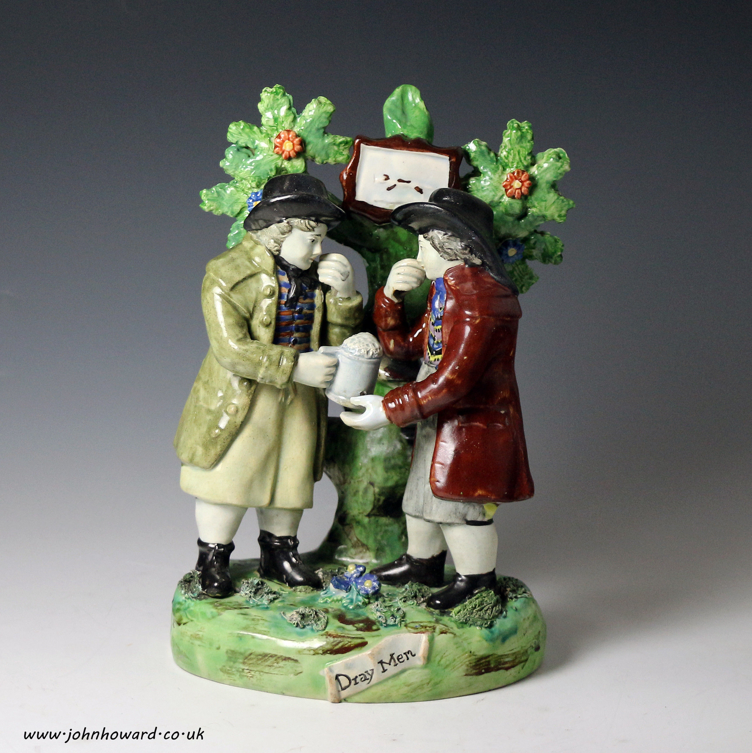 Staffordshire pottery bocage figure titled 