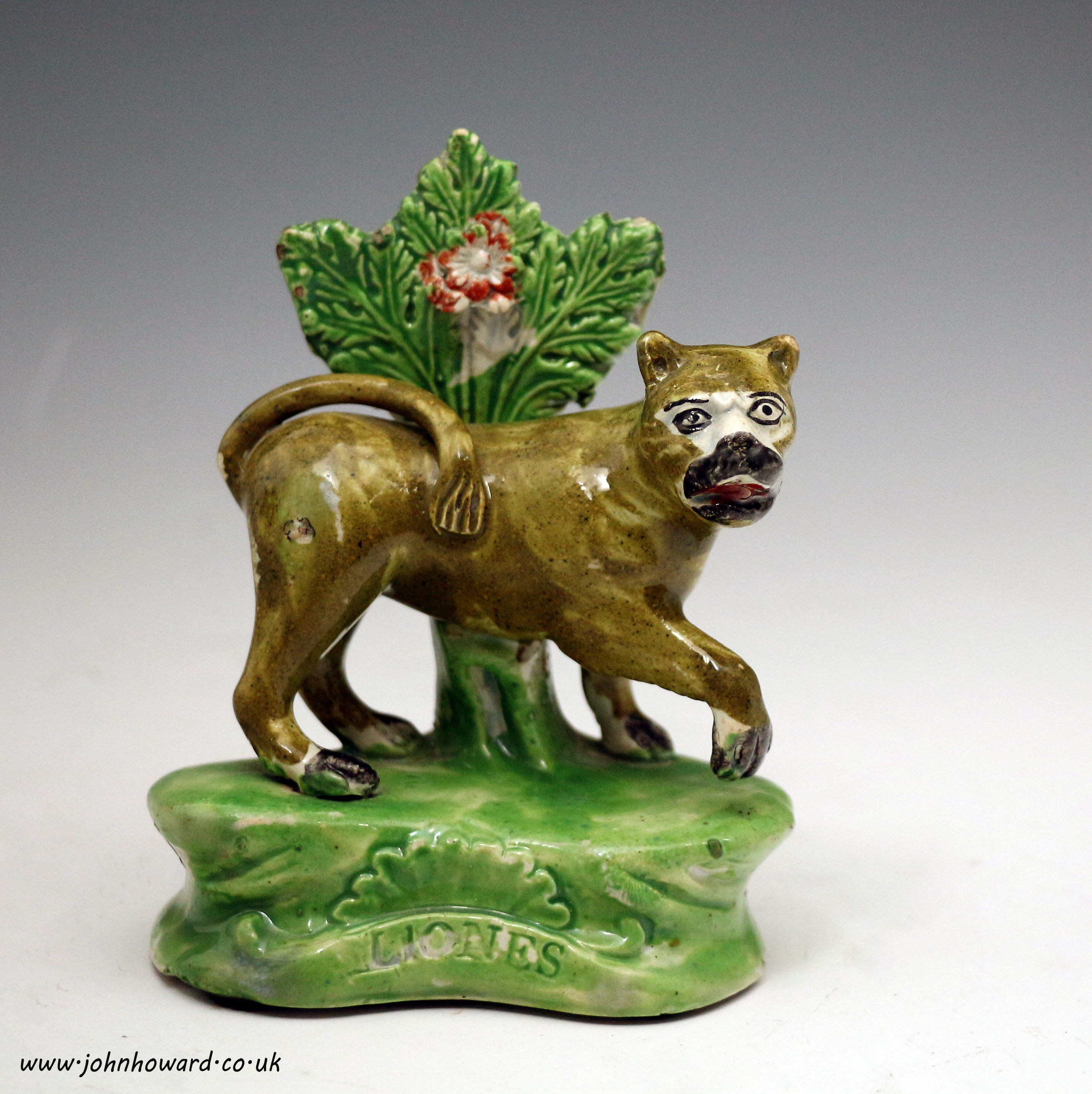 Staffordshire pottery pearlware bocage figure titled 