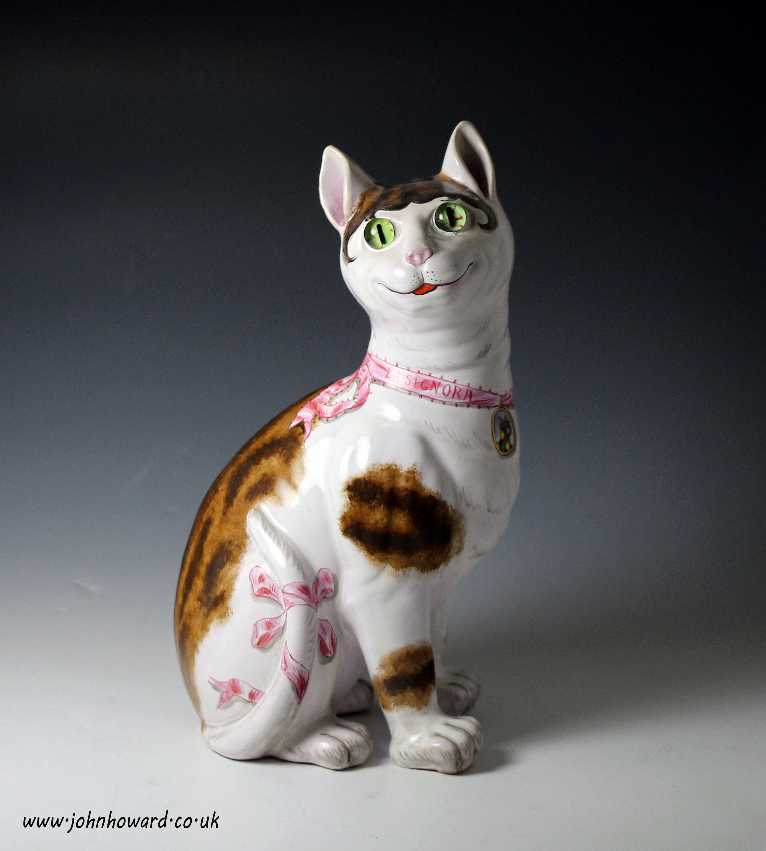 Pottery figure of a comical cat with glass eyes by Emile Galle ,Nancy France c1900