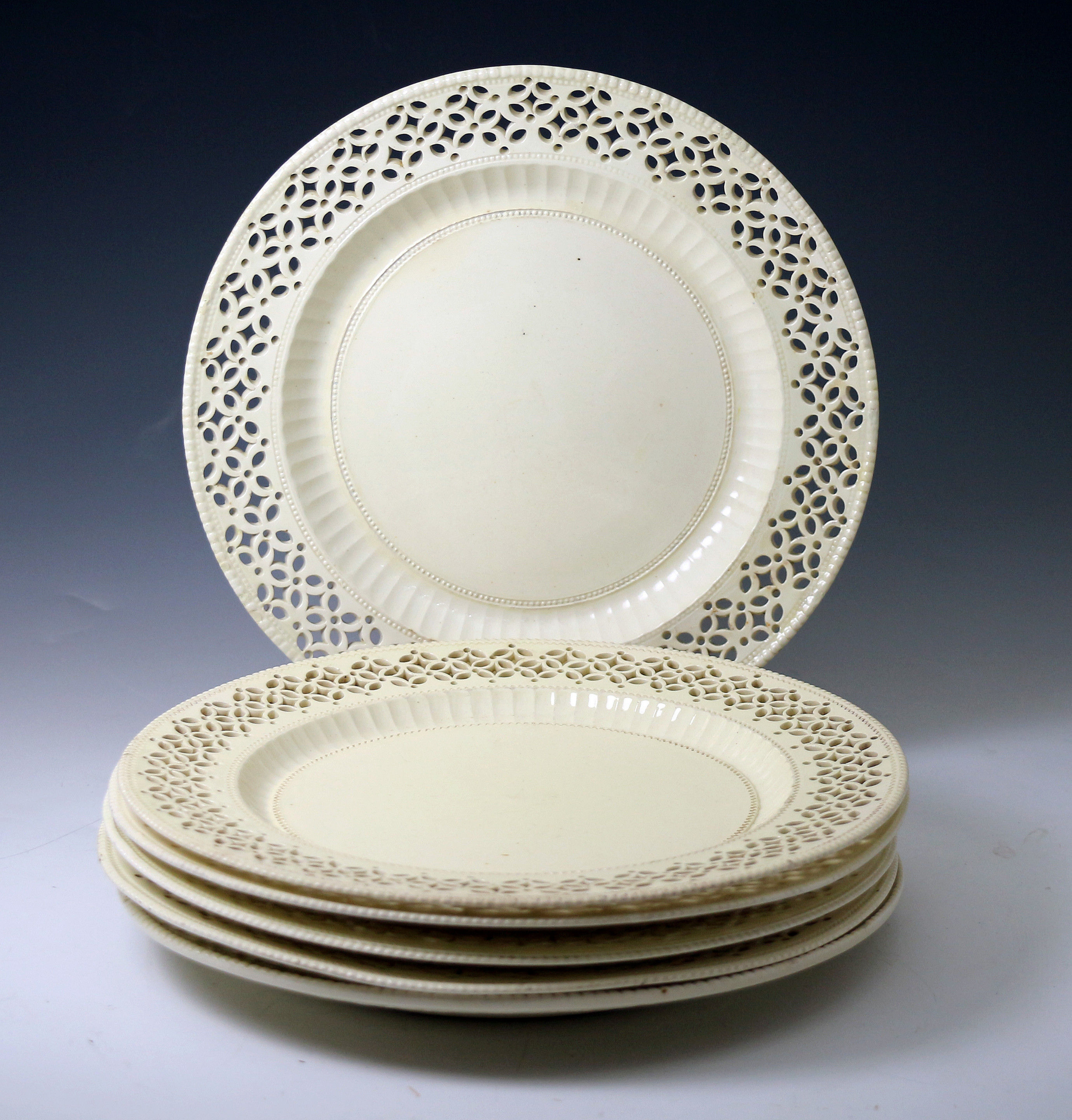 Six English creamware pottery plates with pierced borders 18 th century