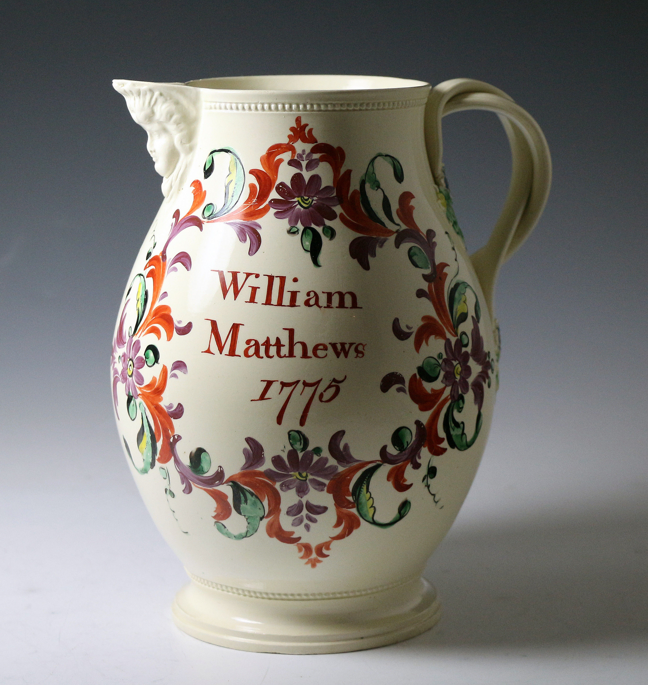 Antique English creamware pottery pitcher named William Mathews and dated 1775