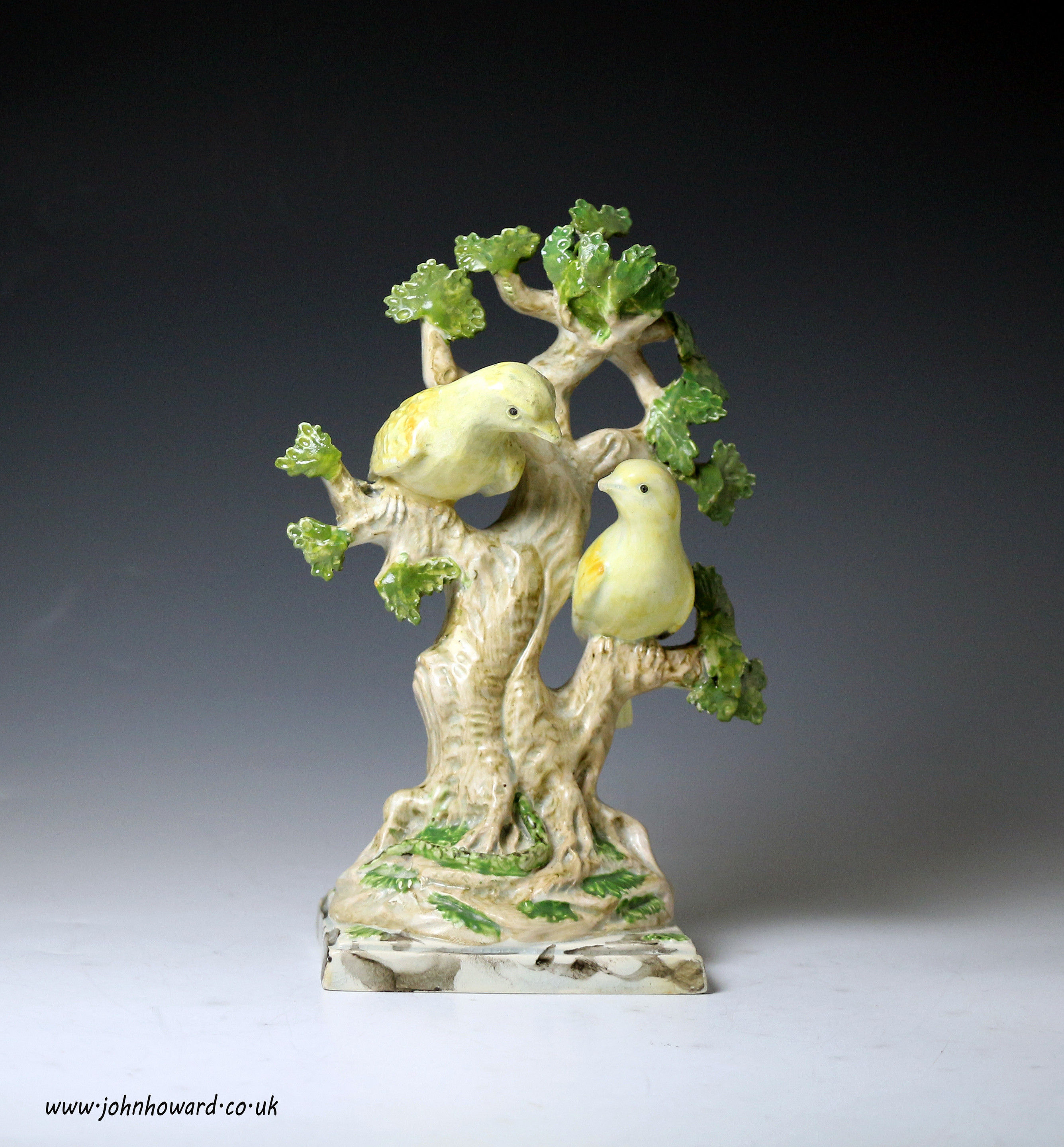 Antique Staffordshire pearlware bocage figure of birds in branches. Late 18th century.