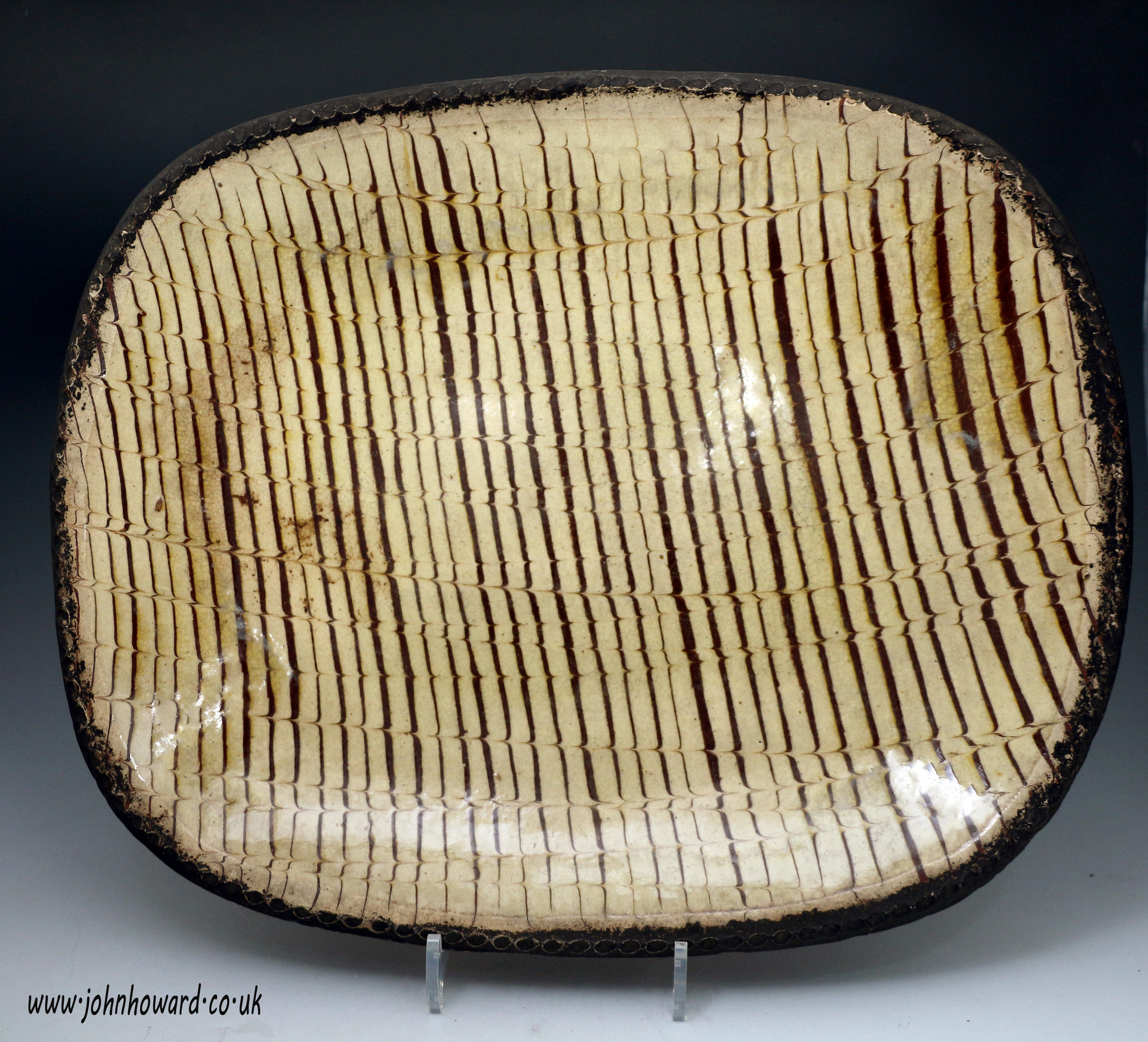 Antique English earthenware pottery slipware loaf dish comb decorated late 18th century