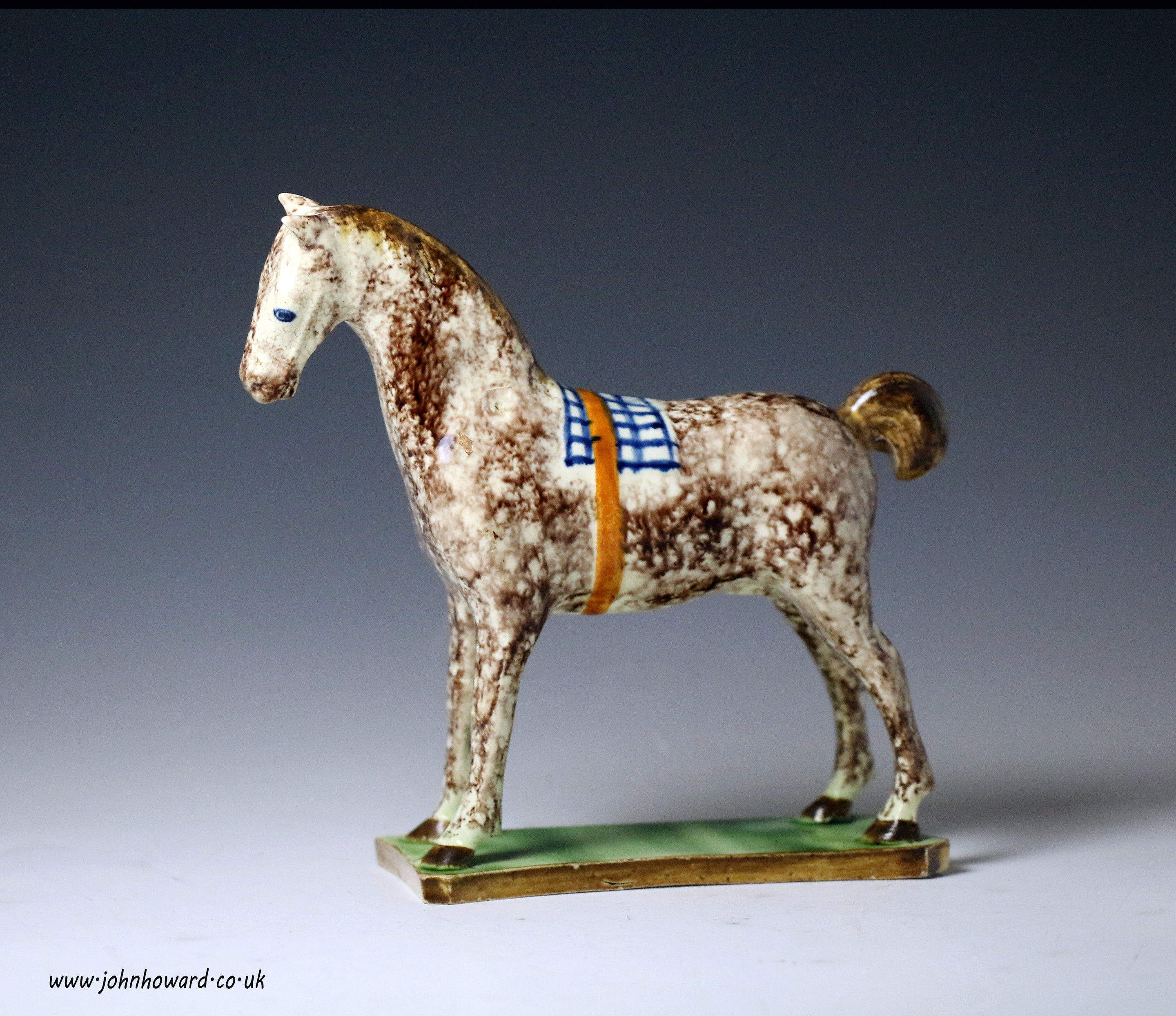 Pottery figure of a horse modelled standing on base North East England circa 1800