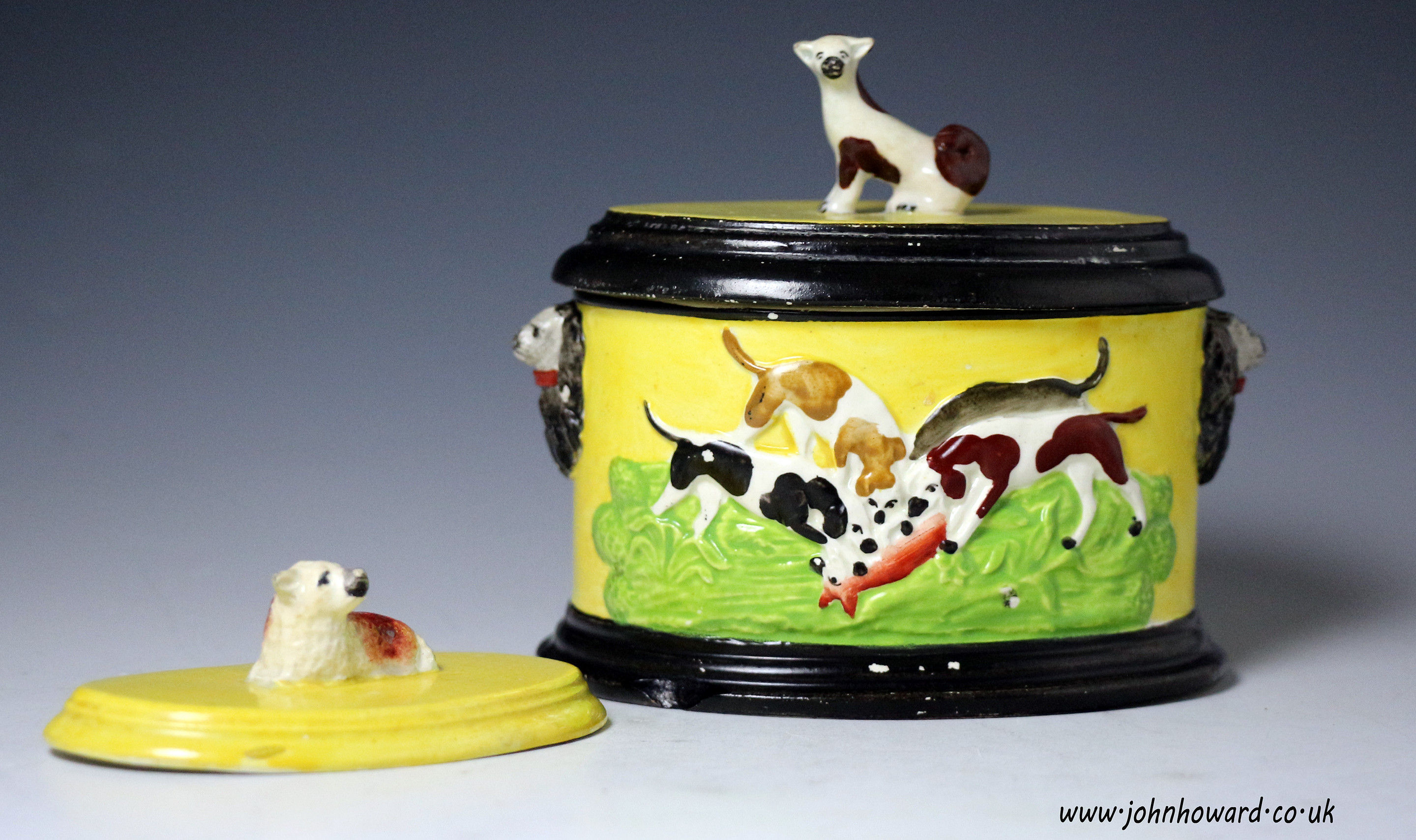 Staffordshire pottery pearlware toboacco box with figures of dog and sheep finials